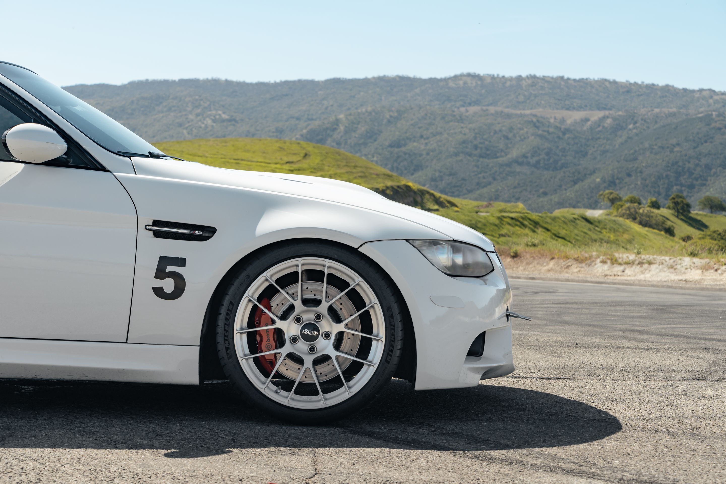White BMW E90 Sedan M3 with 19" EC-7RS Apex wheels in Brushed Clear