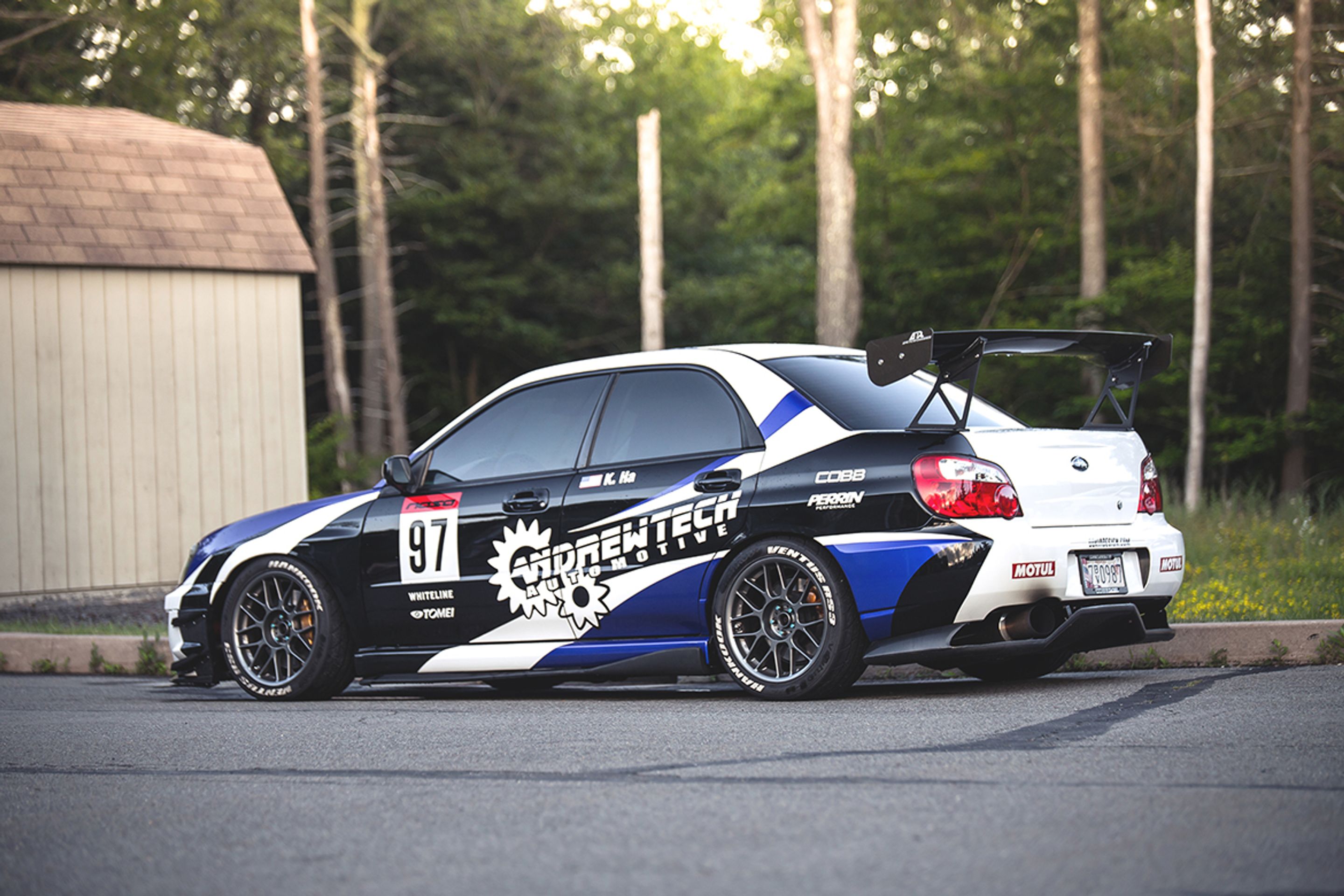 Black Subaru GD WRX Sedan with 17" ARC-8 Apex wheels in Anthracite