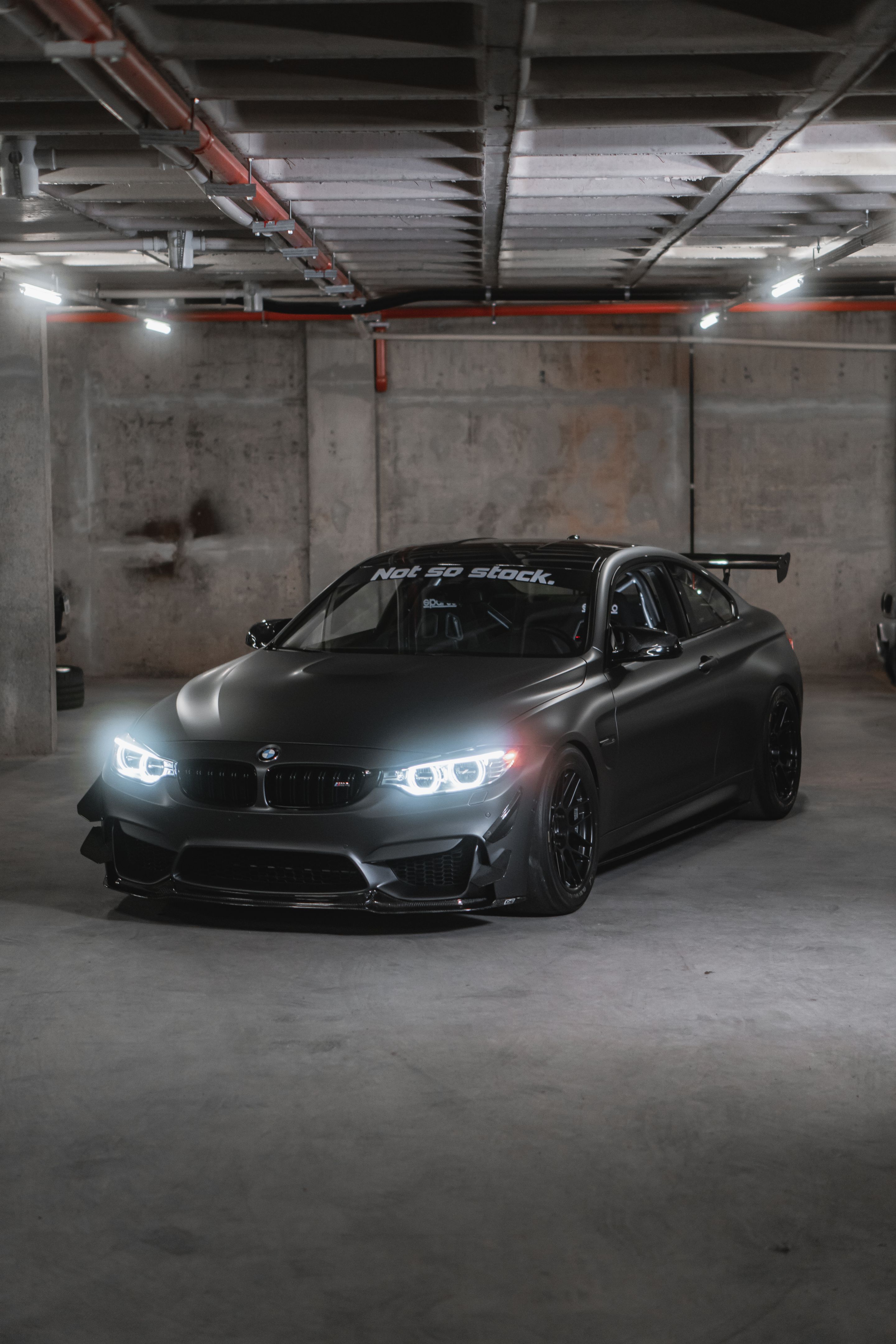 Black BMW F82 Coupe M4 with 18" ARC-8 Apex wheels in Satin Black