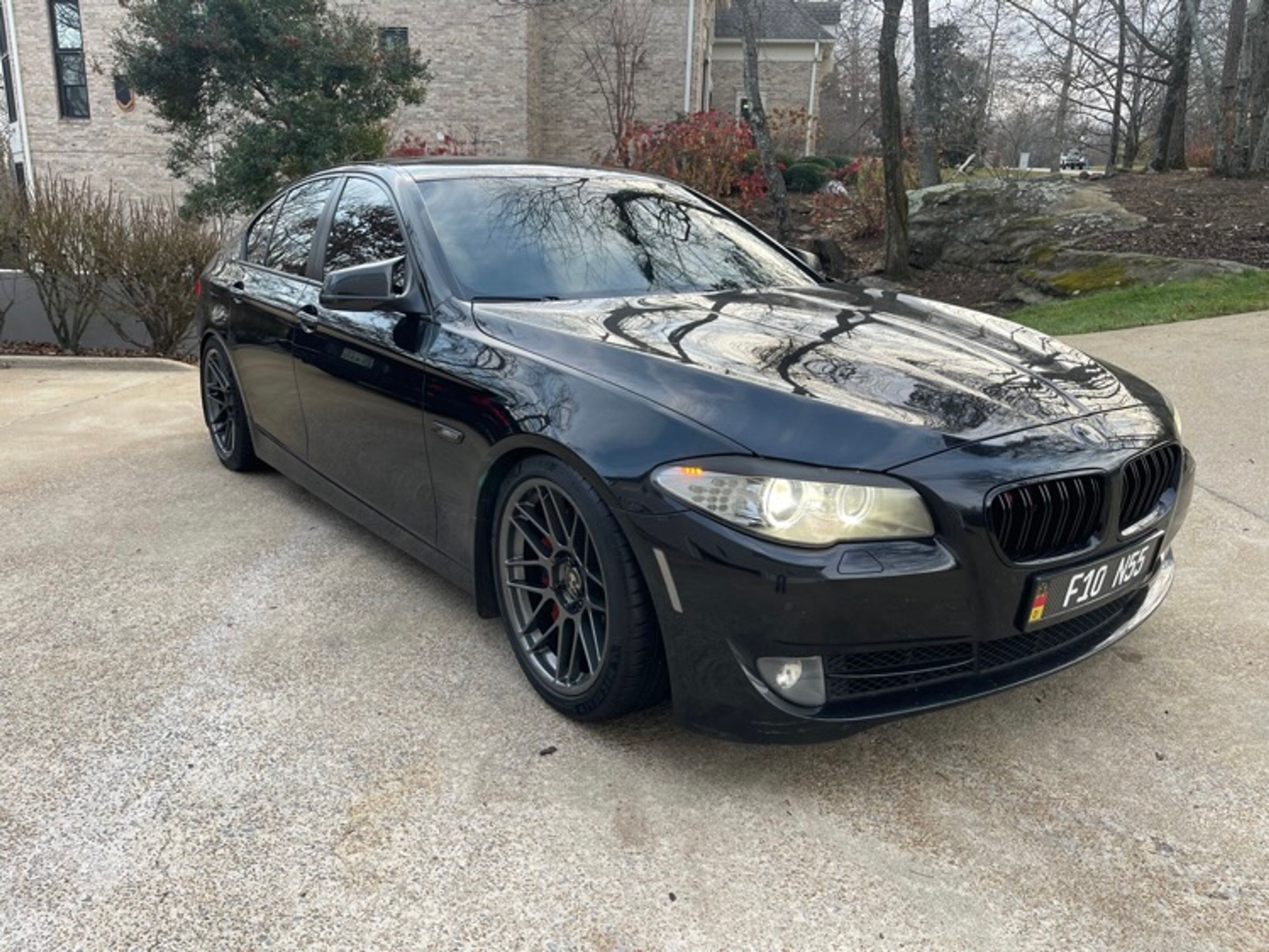 Black BMW F10 Sedan 5 Series with 19" ARC-8 Apex wheels in Anthracite