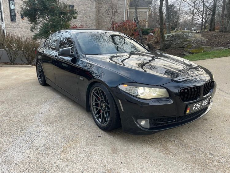 Black BMW F10 Sedan 5 Series with 19" ARC-8 Apex wheels in Anthracite