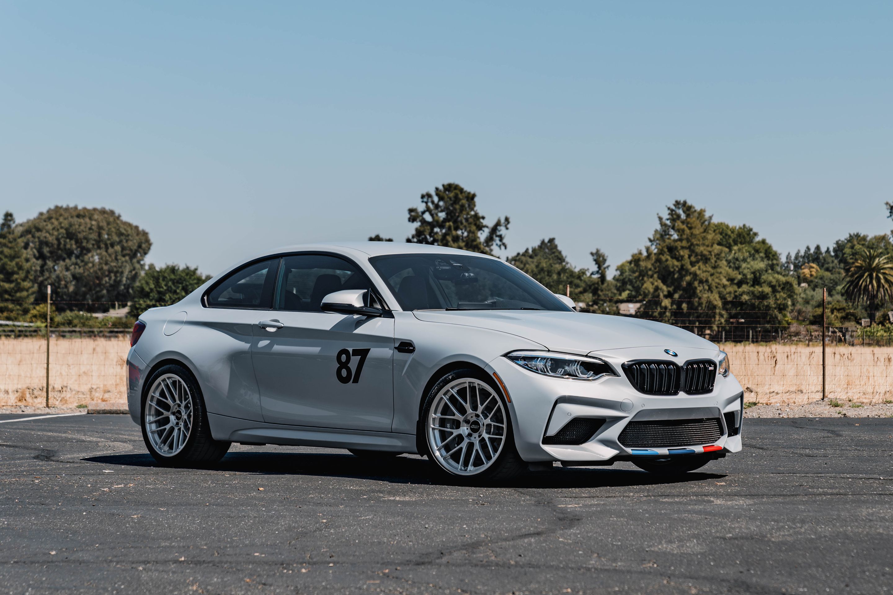 Silver BMW F87 M2 with 19" ARC-8RT Apex wheels in Brushed Clear
