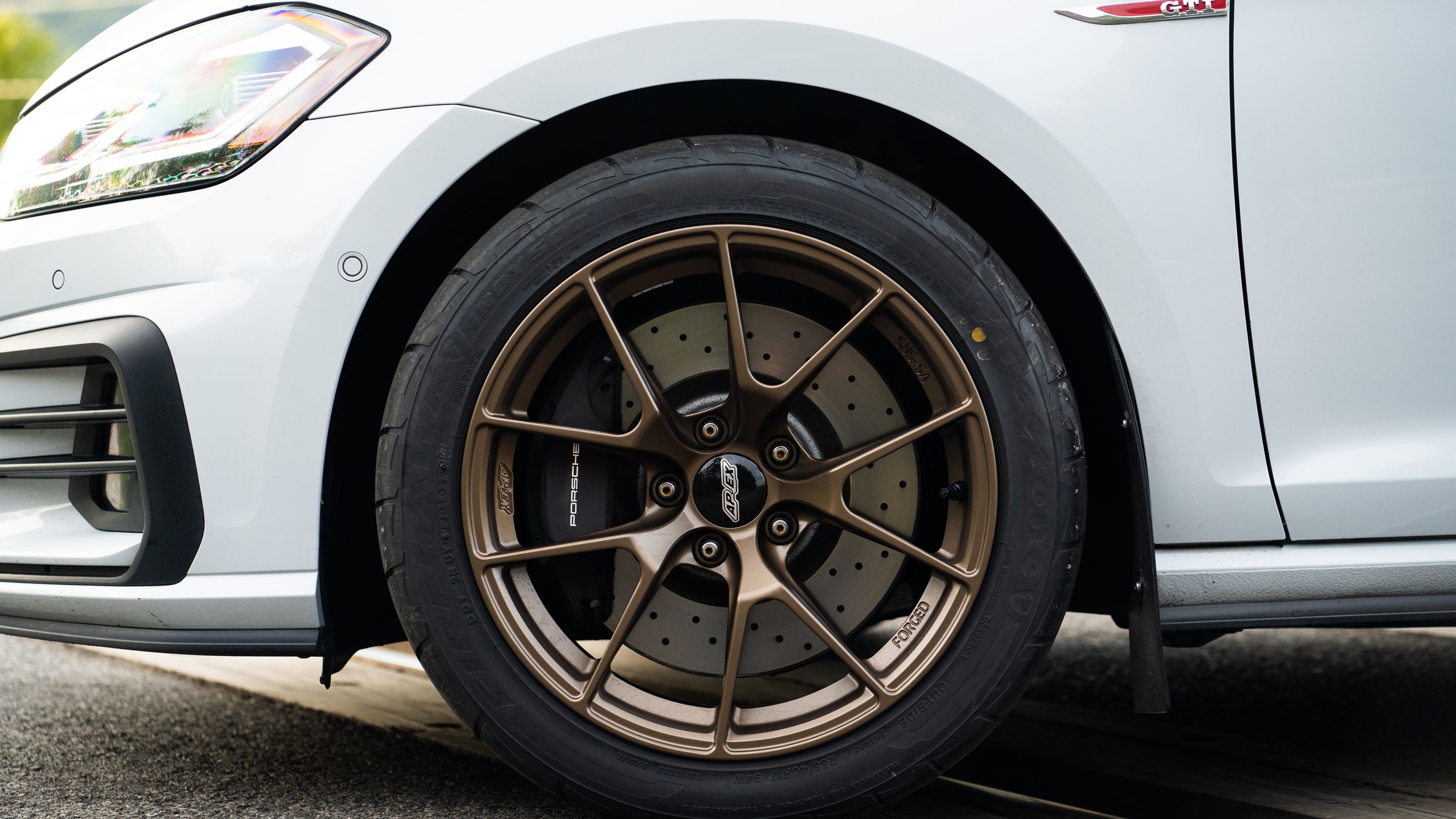 Grey VW MK7 GTI with 17" VS-5RS Apex wheels in Satin Bronze