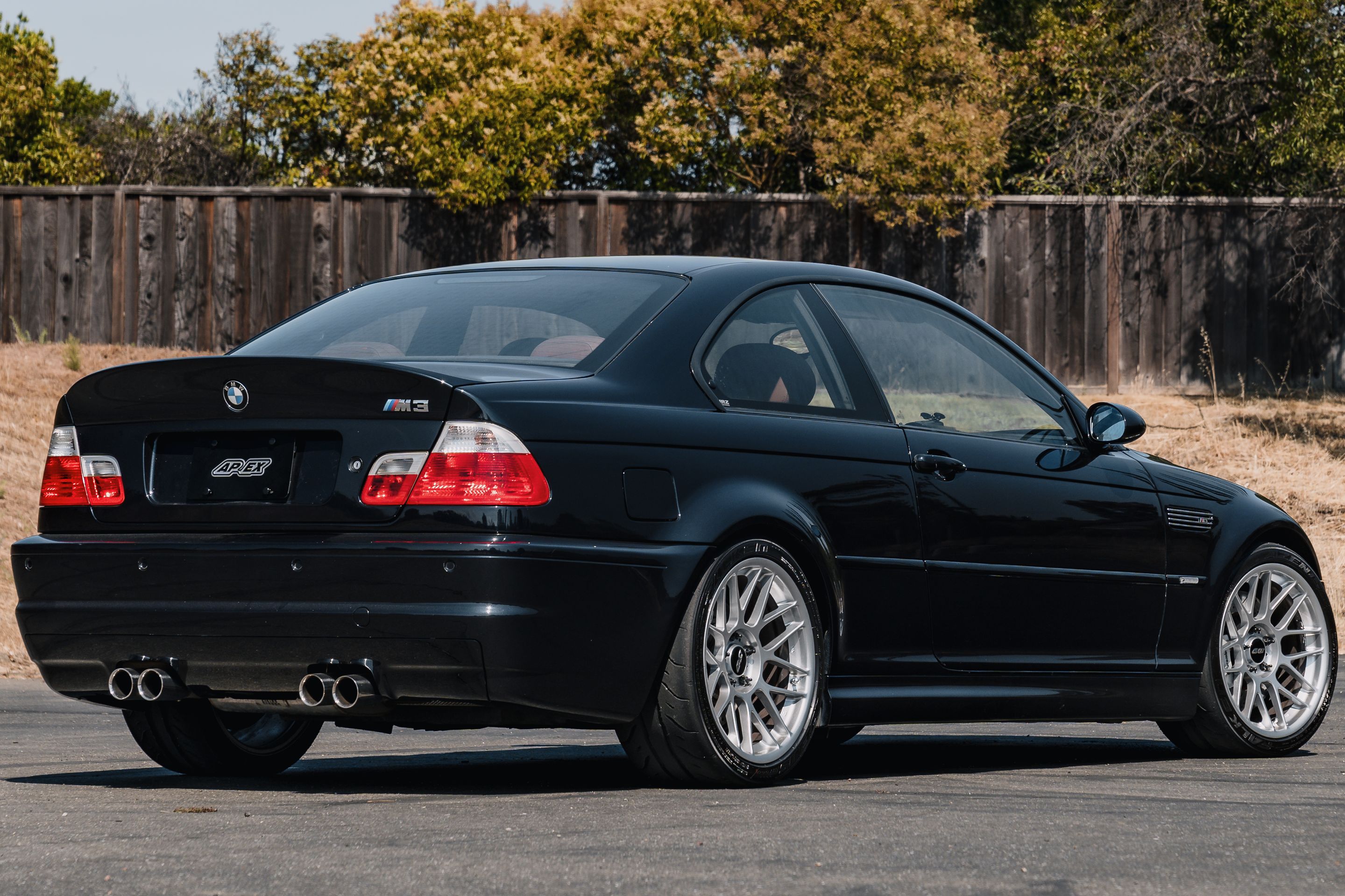 Black BMW E46 M3 with 18" ARC-8 Apex wheels in Hyper Silver