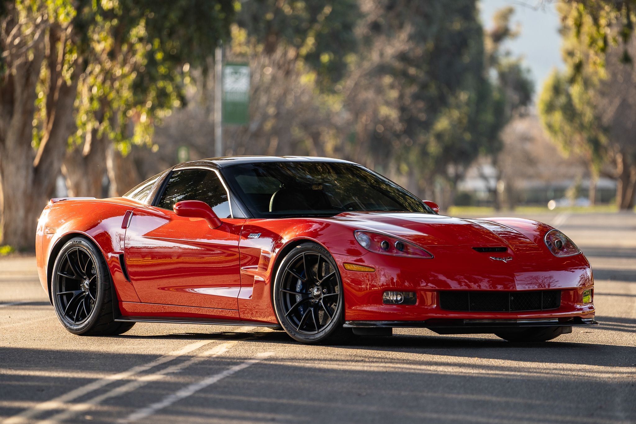 Red Chevrolet C6 Corvette ZR-1 with 19" VS-5RS Apex wheels in Satin Black