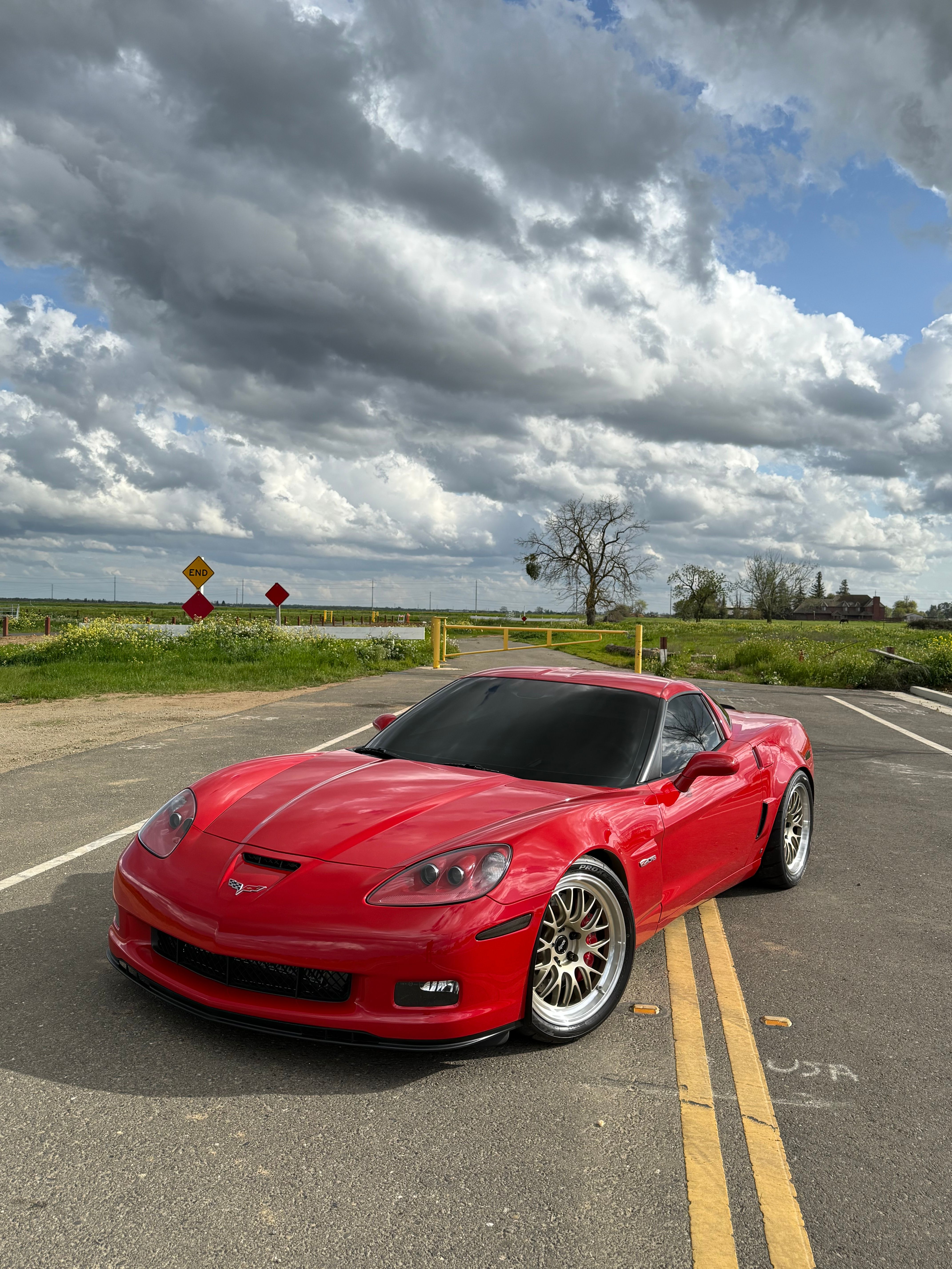 Red Chevrolet C6 Corvette Z06 with 19" ML-10RT Apex wheels in Machined Lip Gloss Motorsport Gold