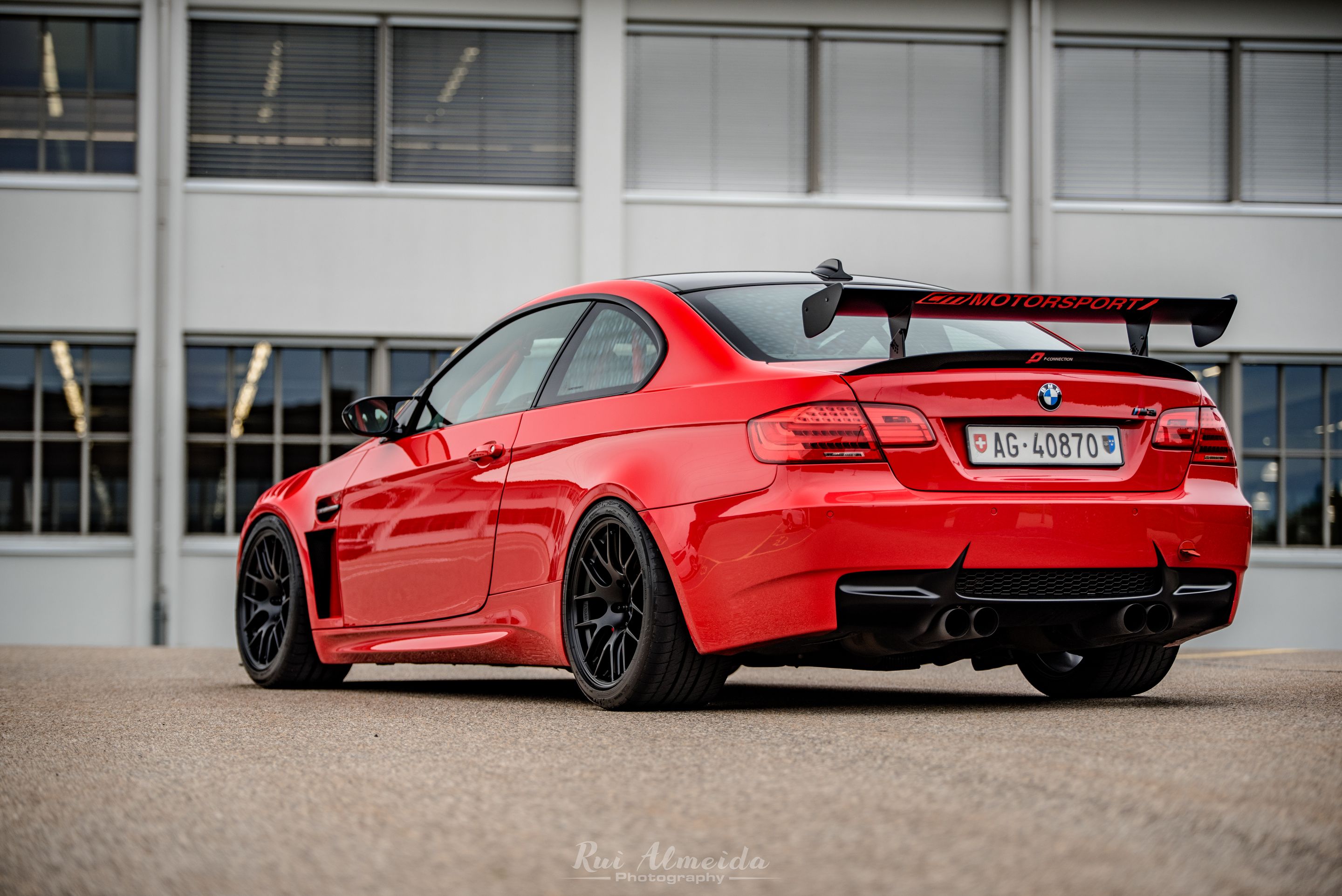 Red BMW E92 Coupe M3 with 18" EC-7R Apex wheels in Satin Black
