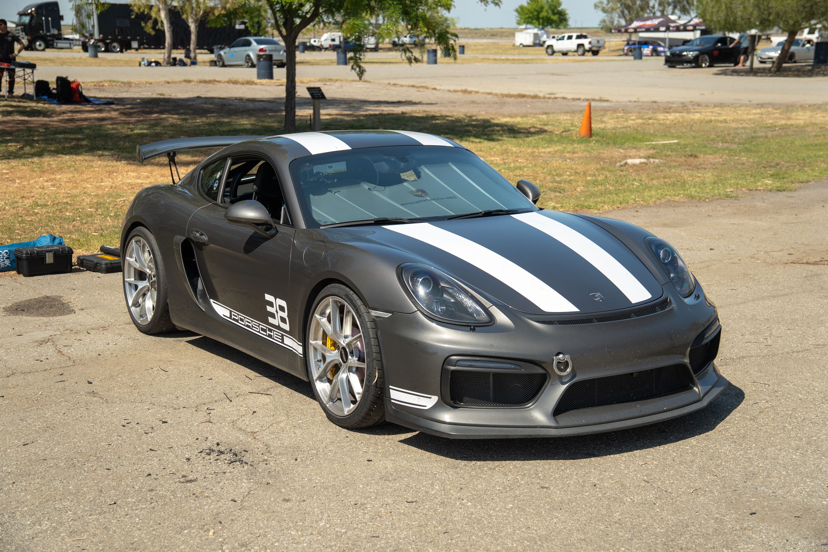 Grey Porsche 981 Cayman GT4 with 20" VS-5RS Apex wheels in Brushed Clear