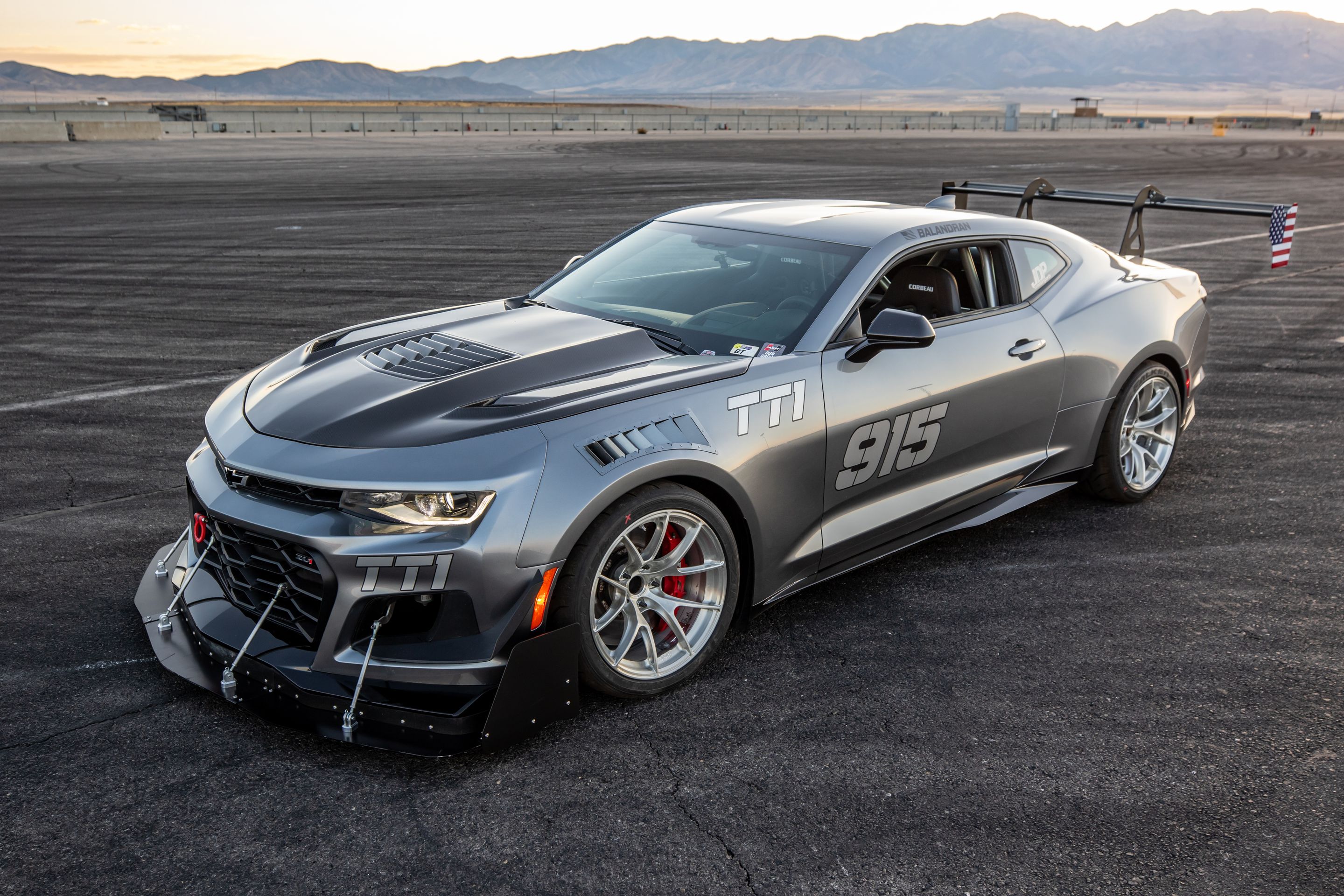 Grey Chevrolet 6th Gen Camaro ZL1 1LE with 18" VS-5RS Apex wheels in Brushed Clear