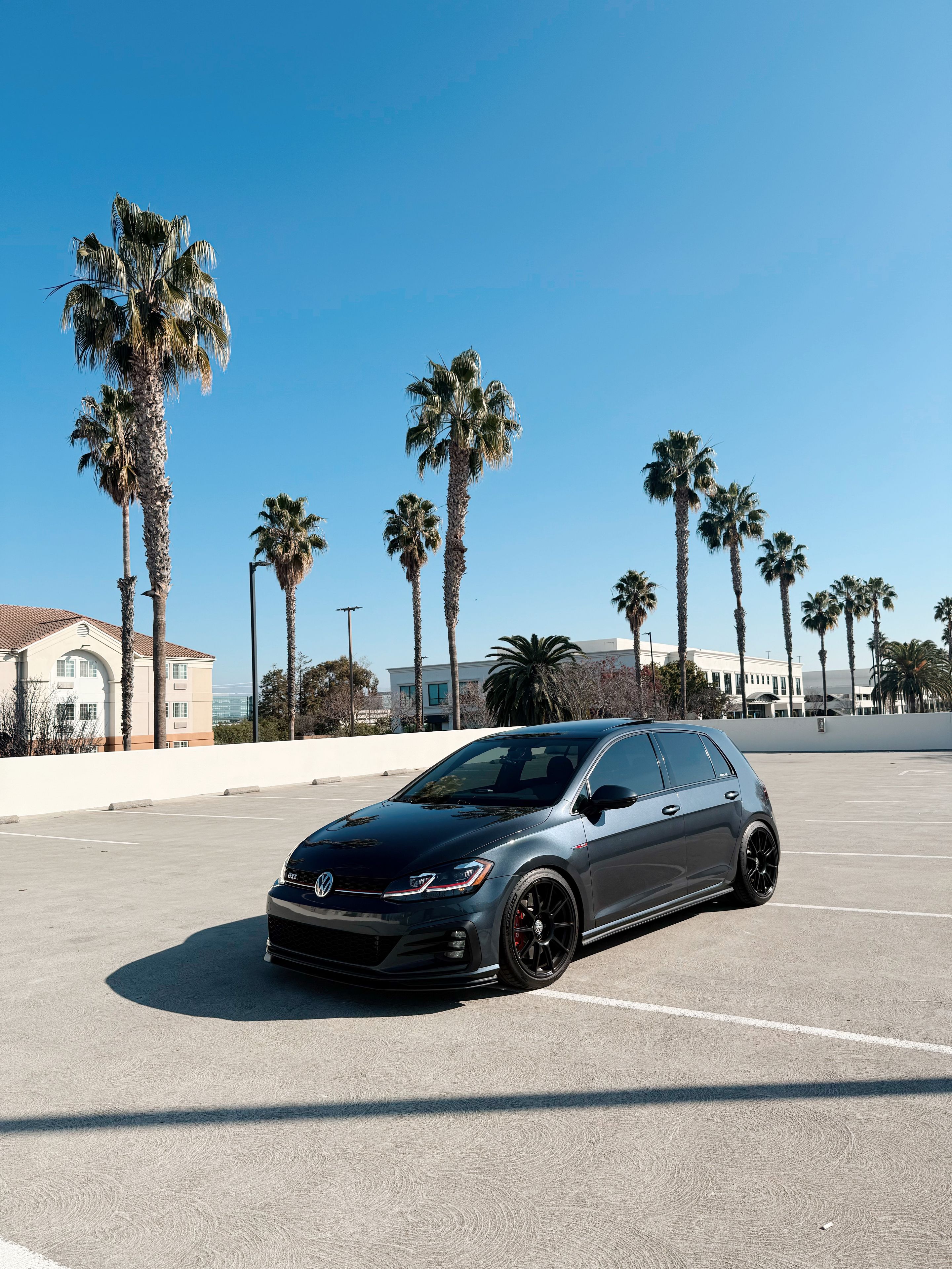 Grey VW MK7 GTI with 18" SM-10 Apex wheels in Satin Black