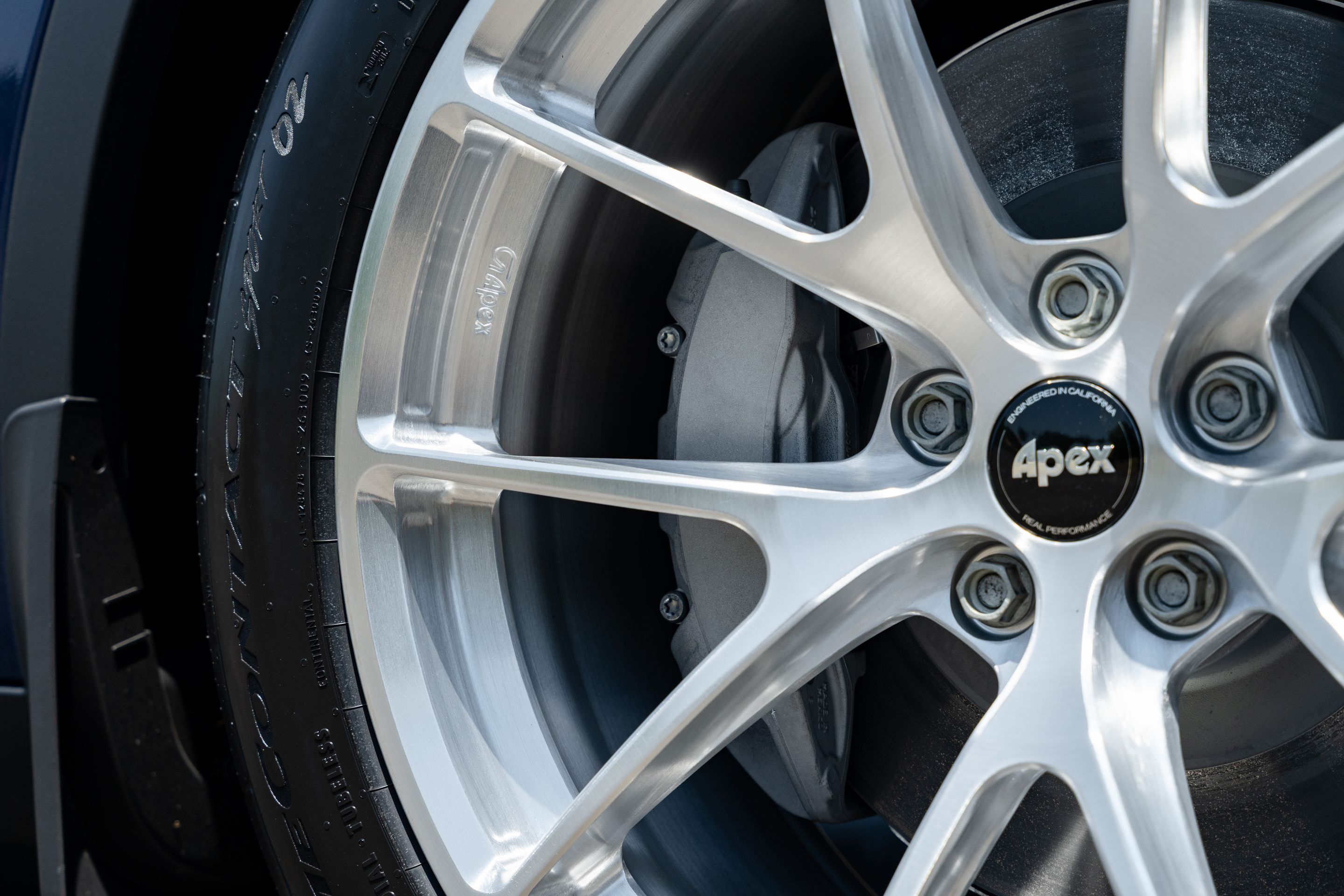 Blue Tesla Model Y RWD/AWD with 20" VS-5RX Apex wheels in Brushed Clear