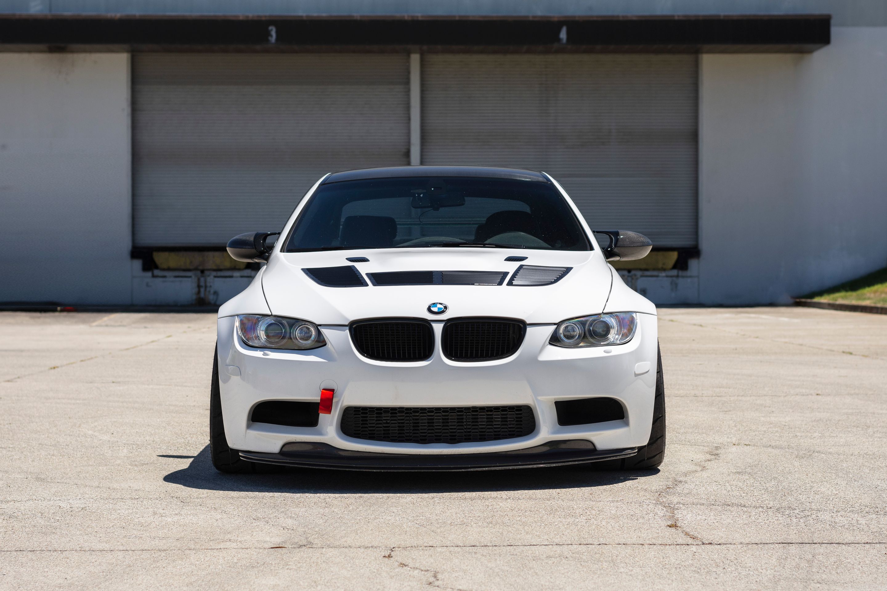 White BMW E92 Coupe M3 with 18" EC-7R Apex wheels in Polished