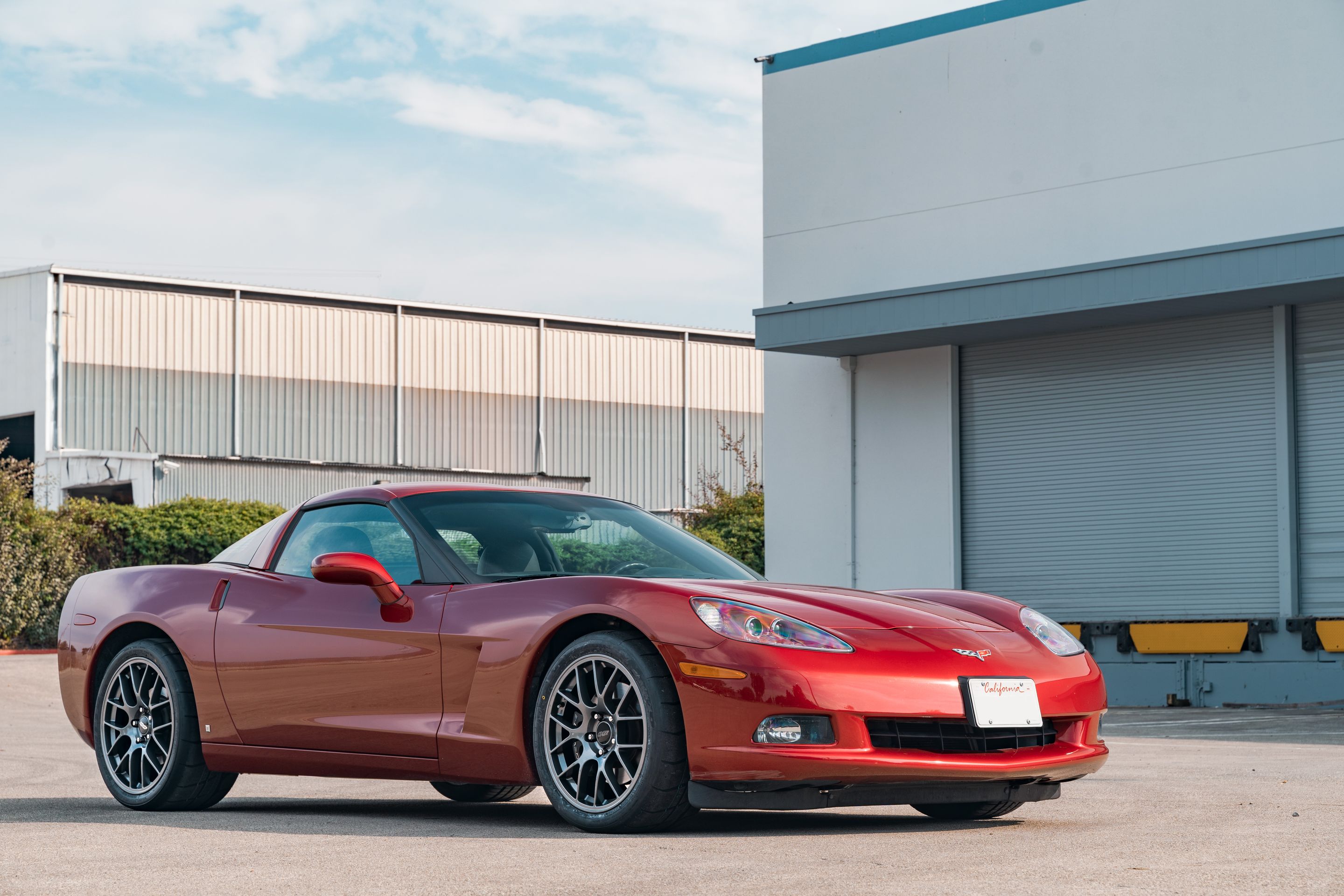 Red Chevrolet C6 Corvette Base/Z51 with 18"/19" EC-7 Apex wheels in Anthracite