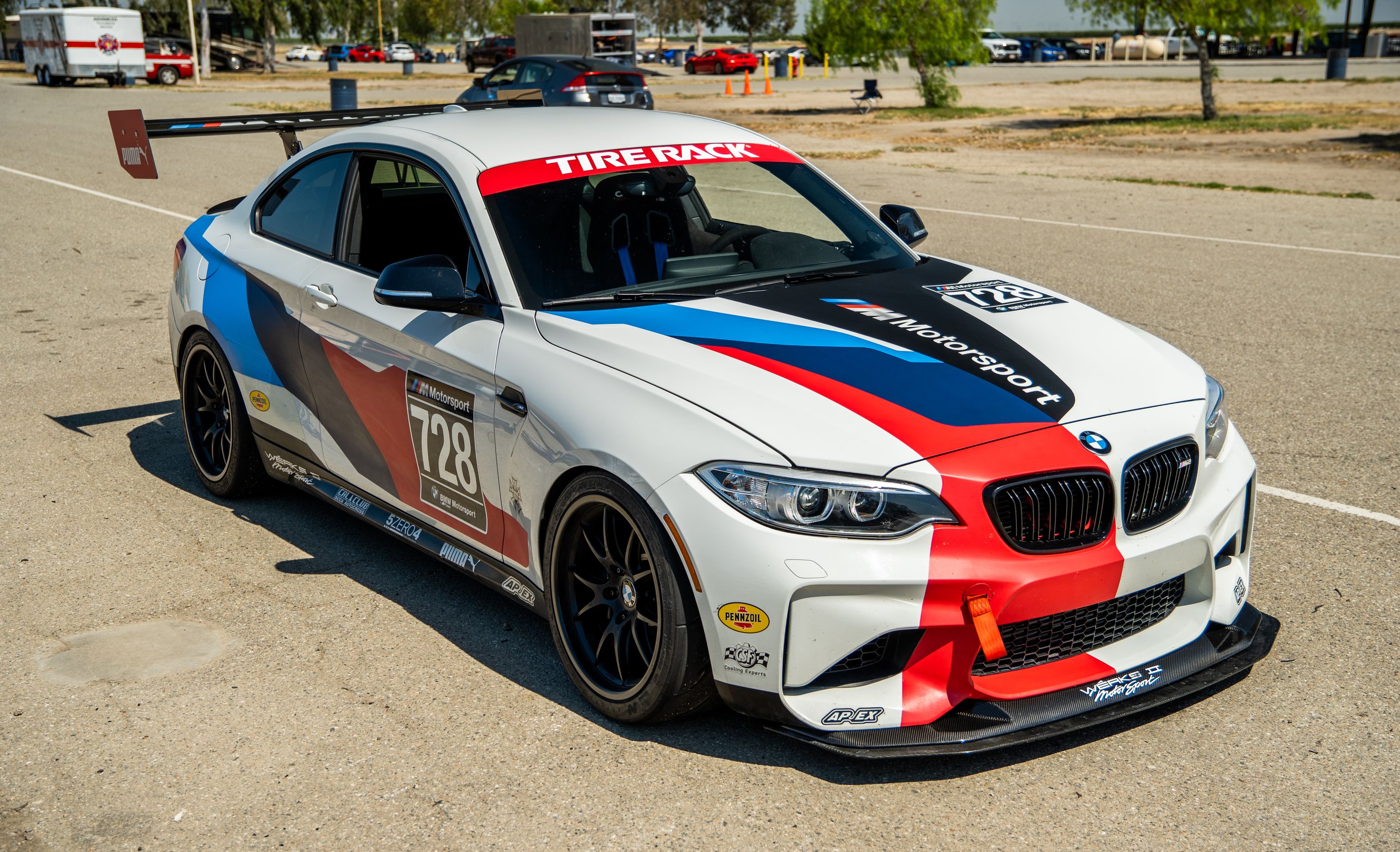 White BMW F87 M2 with 18" FL-5 Apex wheels in Satin Black