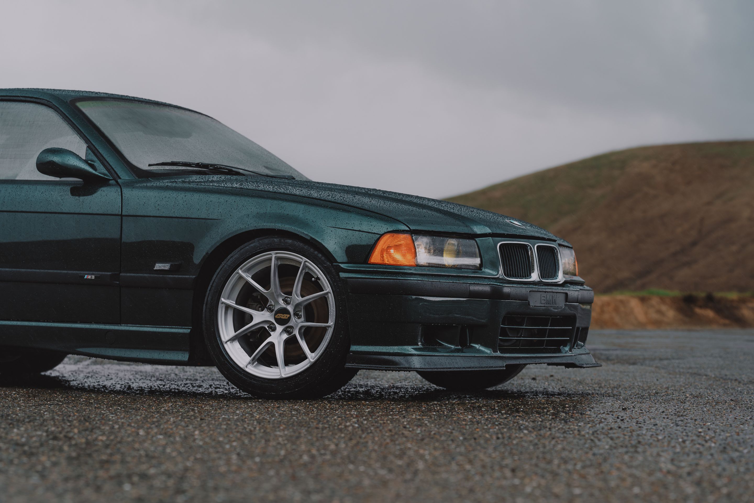 Green BMW E36 M3 with 17" VS-5RS Apex wheels in Brushed Clear