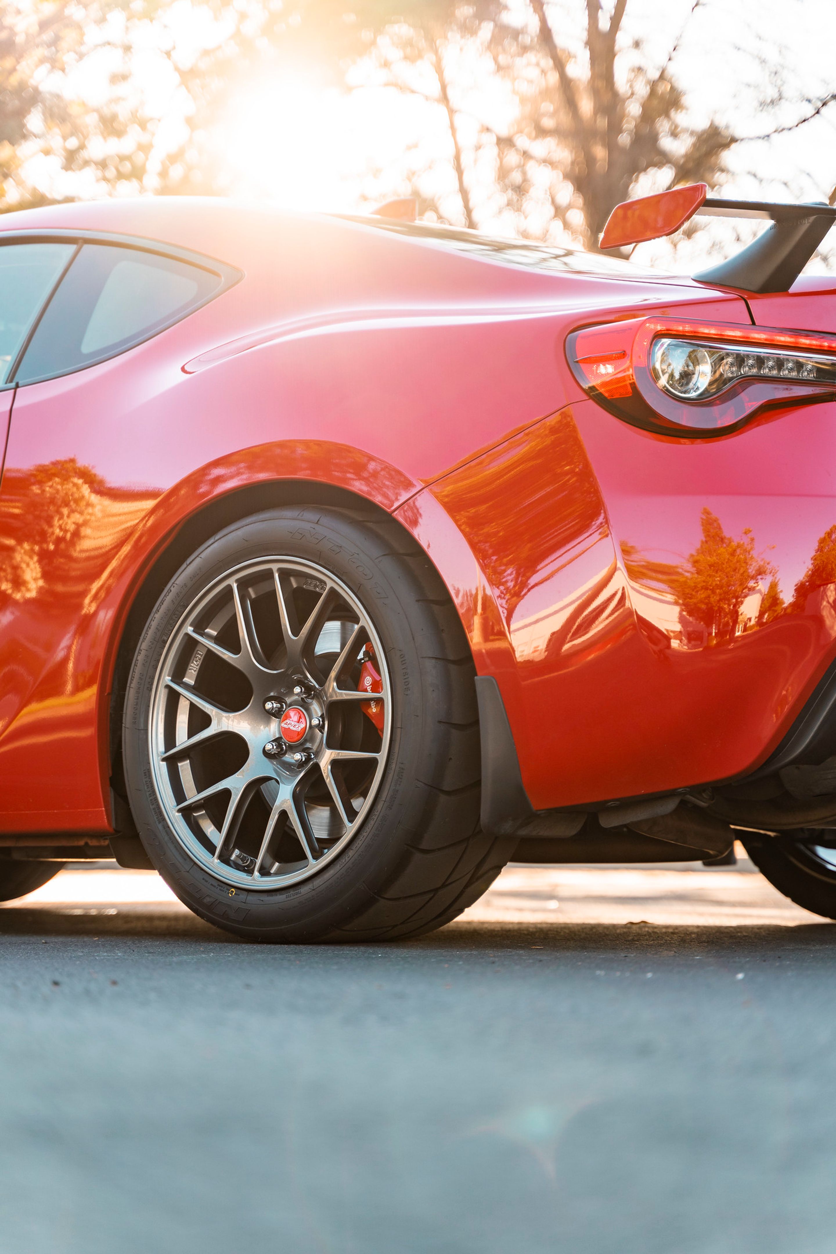 Red Subaru ZC6 / Gen 1 BRZ with 17" EC-7R Apex wheels in Anthracite