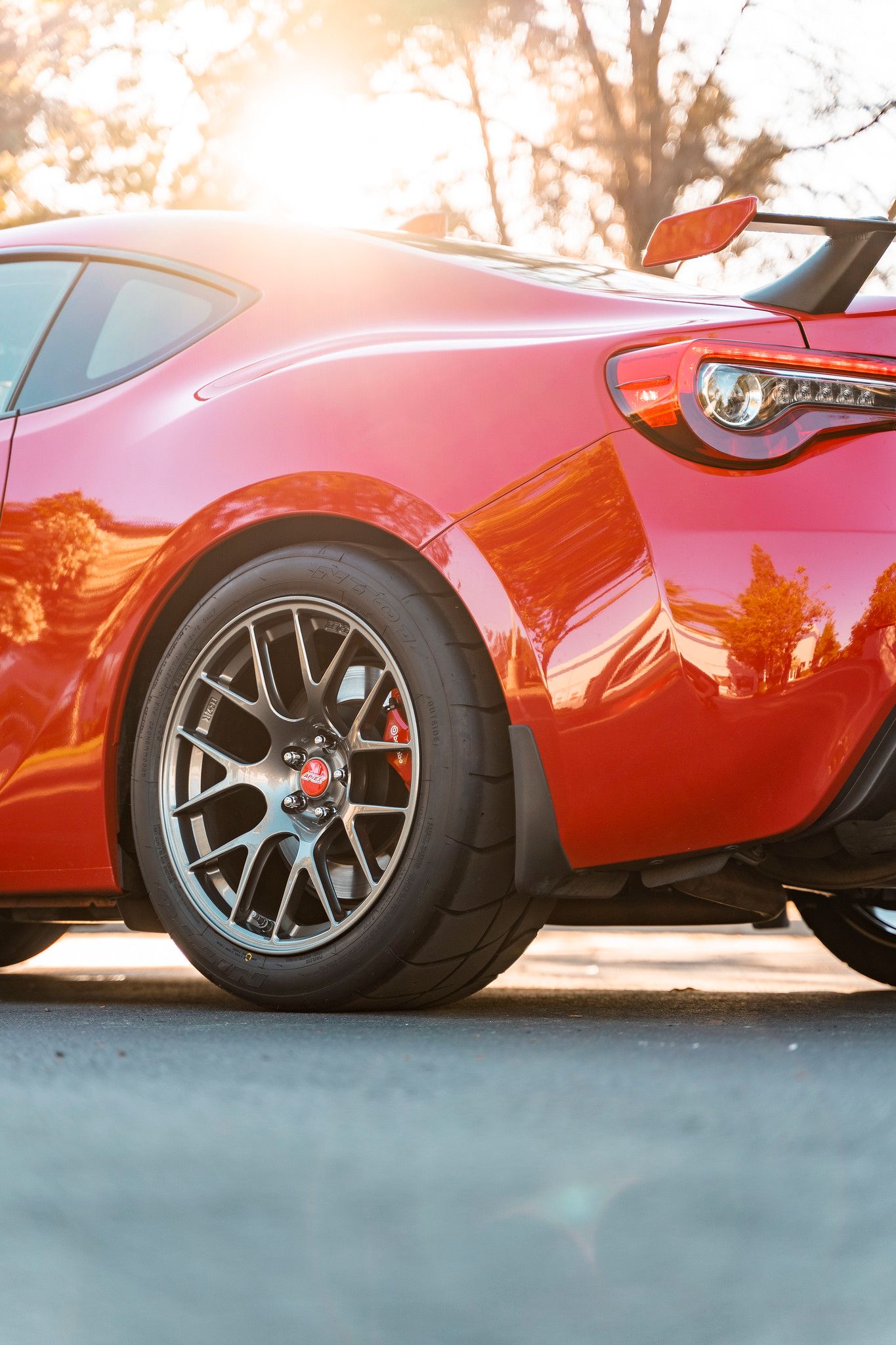 Red Subaru ZC6 / Gen 1 BRZ with 17" EC-7R Apex wheels in Anthracite
