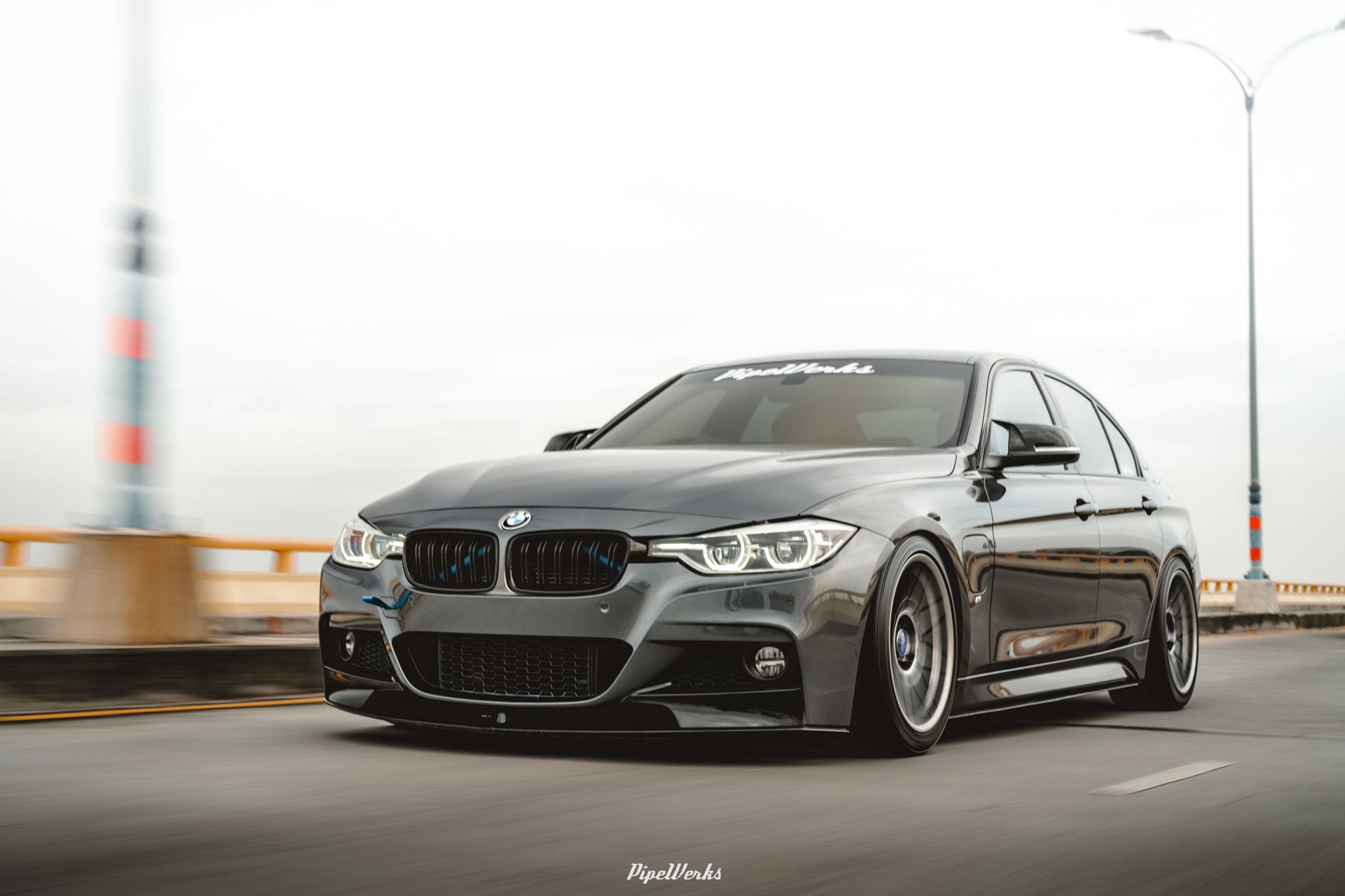 Grey BMW F30 Sedan 3 Series with 18" ARC-8 Apex wheels in Hyper Black