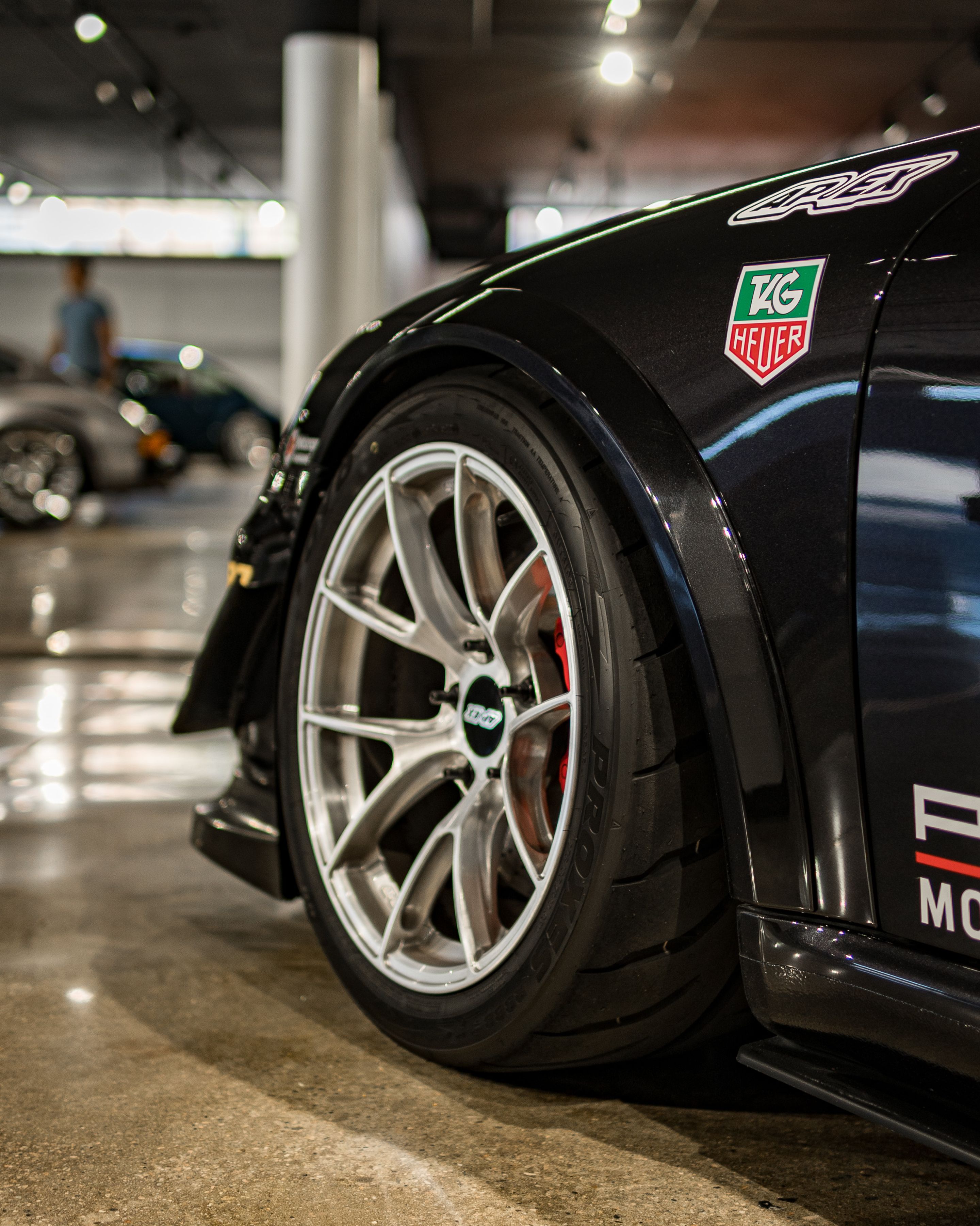 Black Porsche 911 997 Carrera S with 18" VS-5RS Apex wheels in Brushed Clear