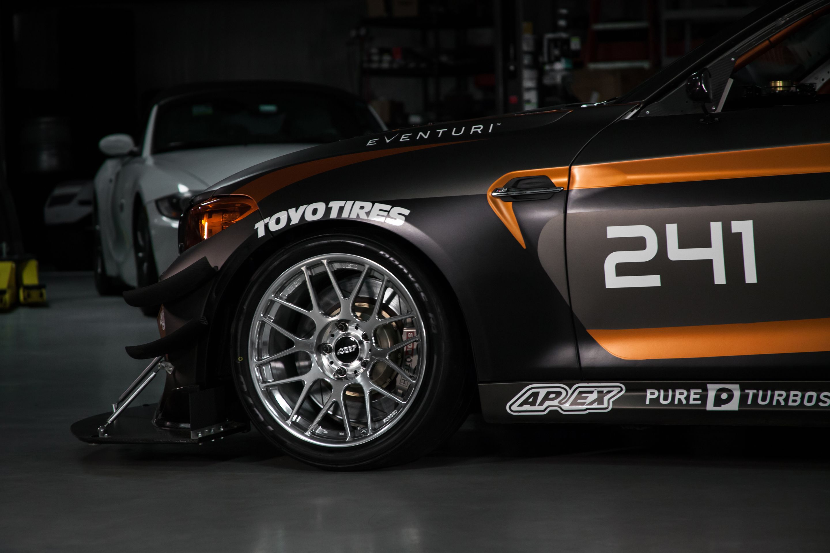 Multicolor BMW F87 M2 with 18" ARC-8R Apex wheels in Polished