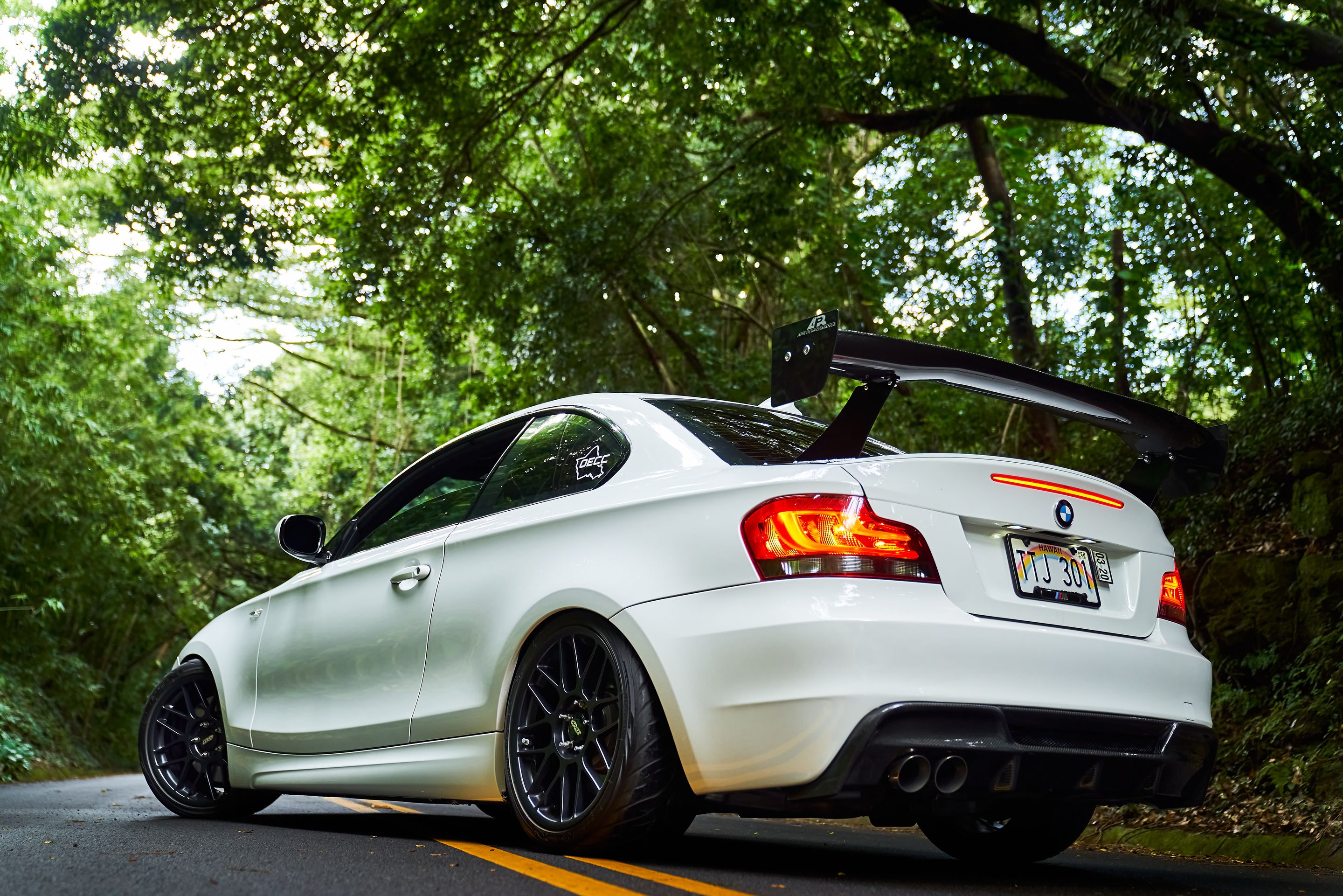 White BMW E82 Coupe 1 Series with 18" ARC-8 Apex wheels in Satin Black