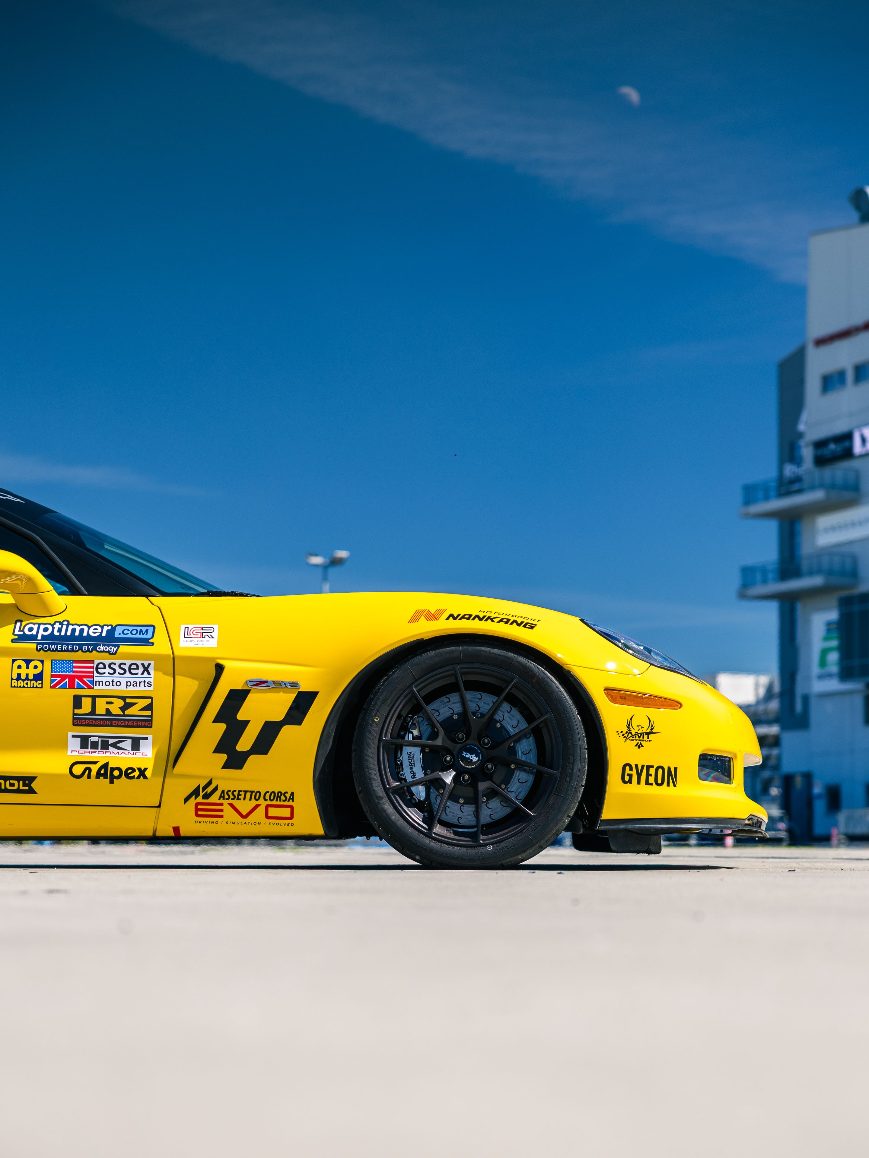 Yellow Chevrolet C6 Corvette Z06 with 18" VS-5RS Apex wheels in Satin Black