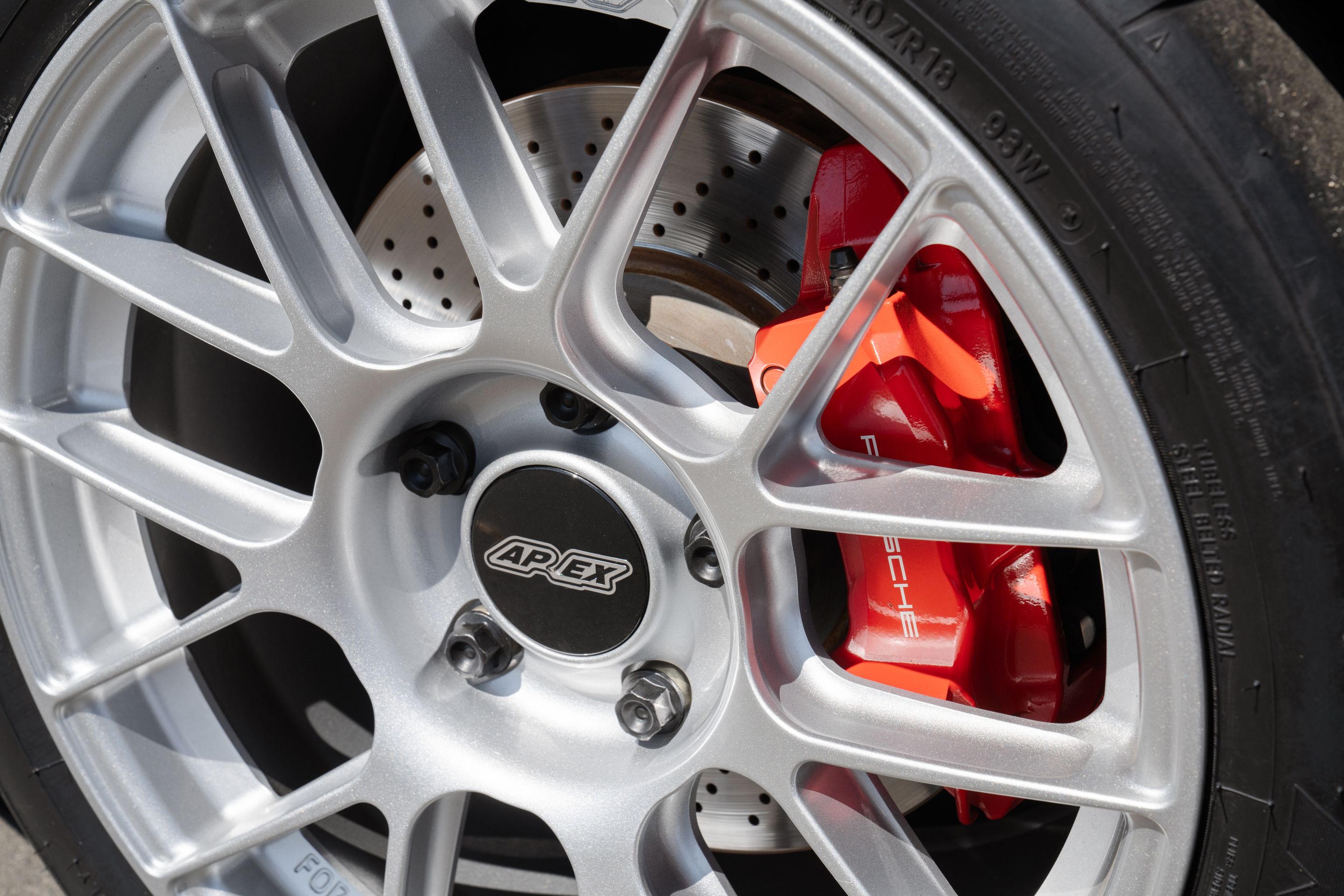 Black Porsche 911 997 Carrera 4S with 18" EC-7RS Apex wheels in Race Silver