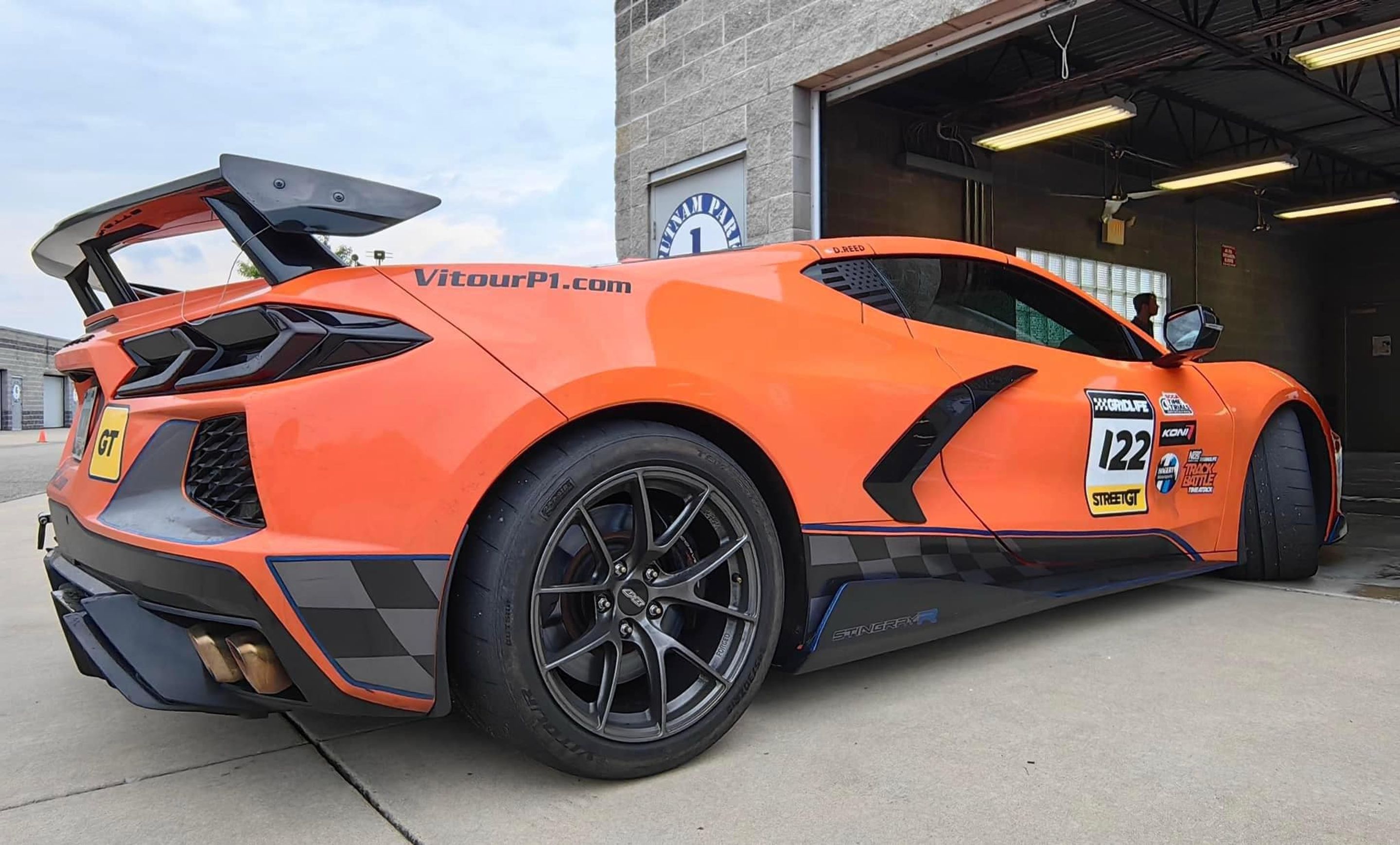 Orange Chevrolet C8 Corvette Stingray/Z51 with 18" VS-5RS Apex wheels in Anthracite