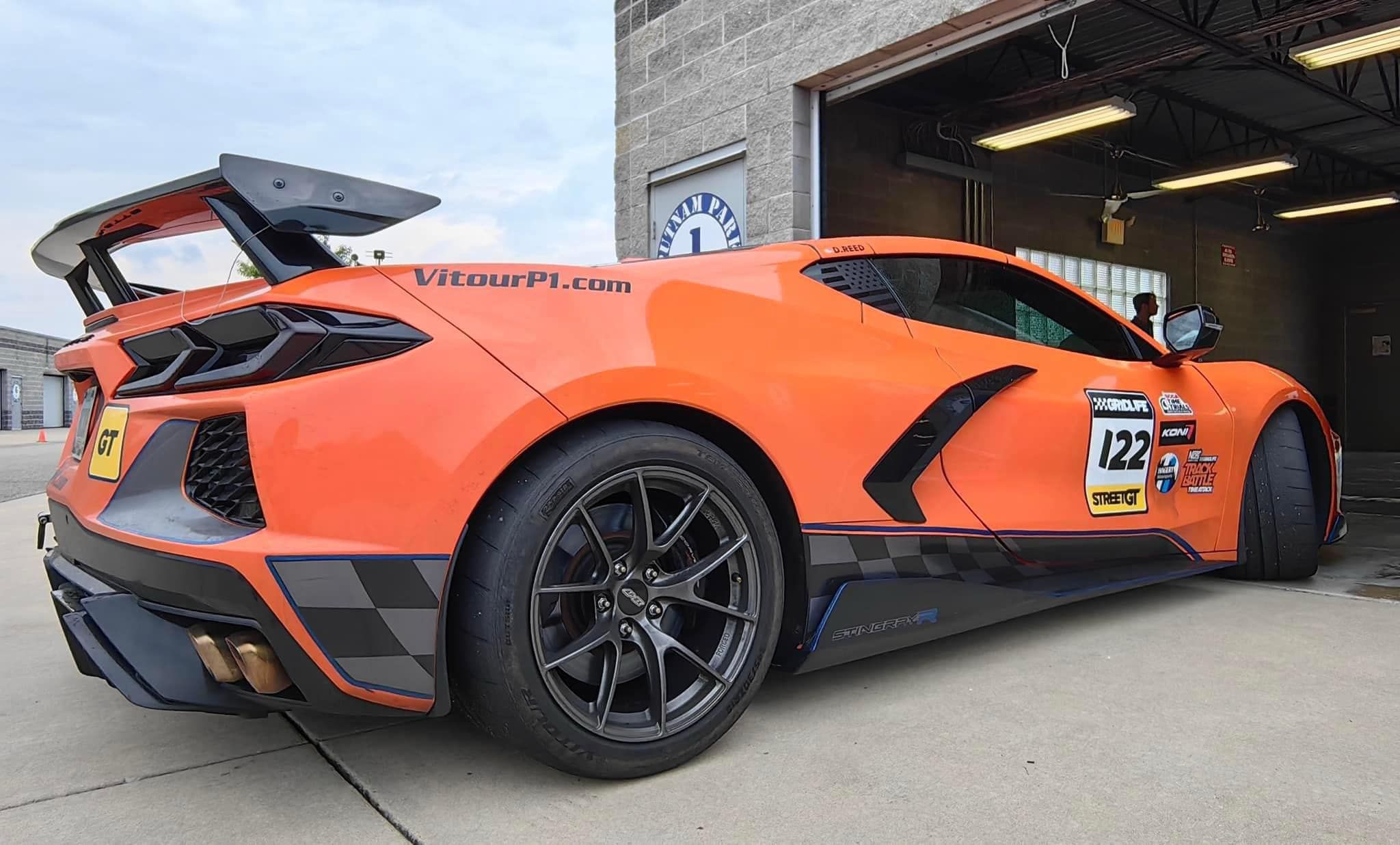 Orange Chevrolet C8 Corvette Stingray/Z51 with 18" VS-5RS Apex wheels in Anthracite