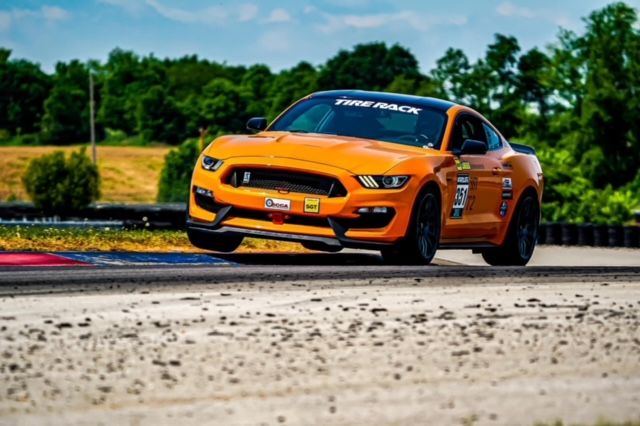 Orange Ford S550 Mustang GT350 with 19" SM-10 Apex wheels in Anthracite