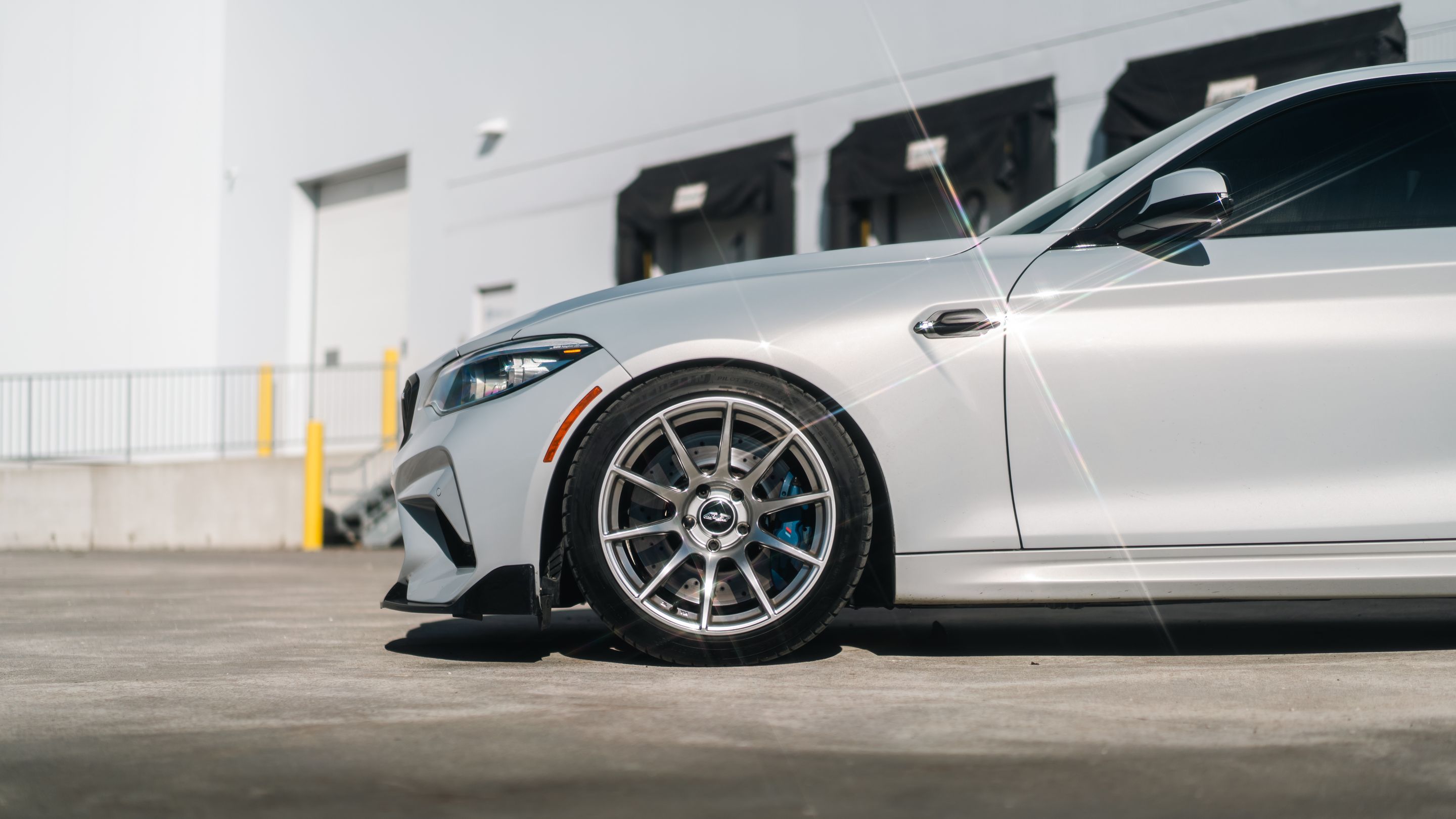 Silver BMW F87 M2 with 18" SM-10 Apex wheels in Anthracite