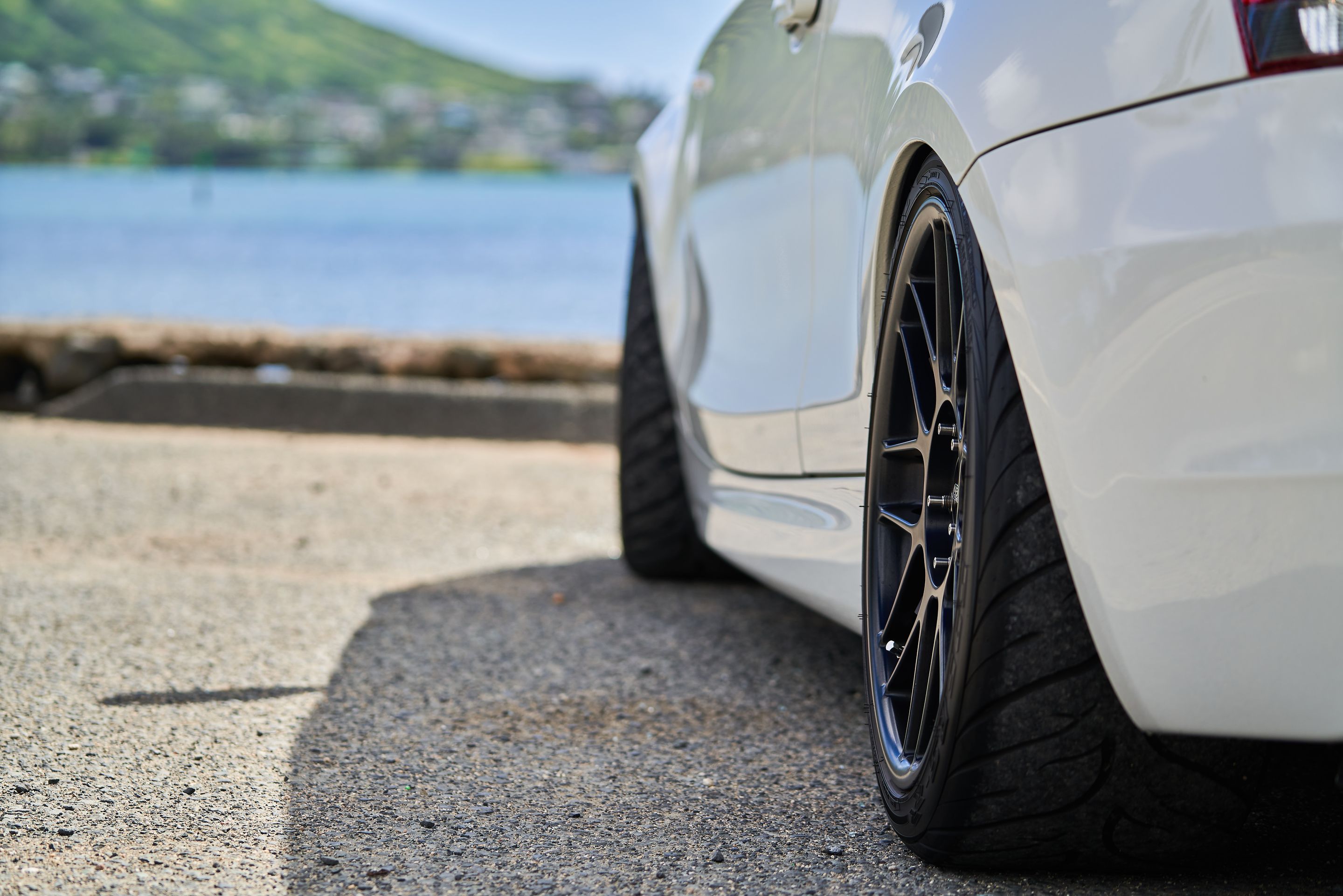 White BMW E82 Coupe 1 Series with 18" ARC-8 Apex wheels in Satin Black