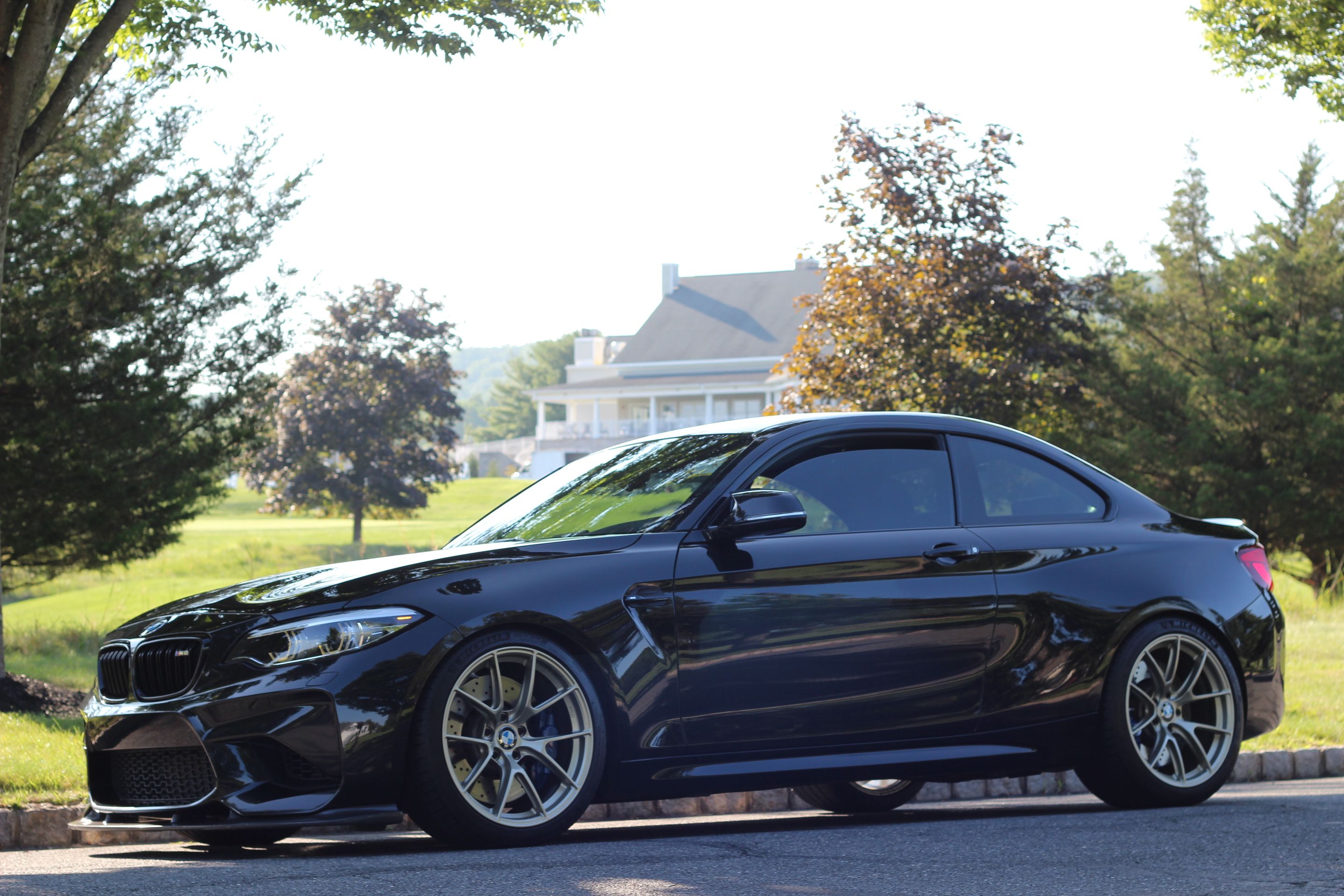 Black BMW F87 M2 with 19" VS-5RS Apex wheels in Motorsport Gold
