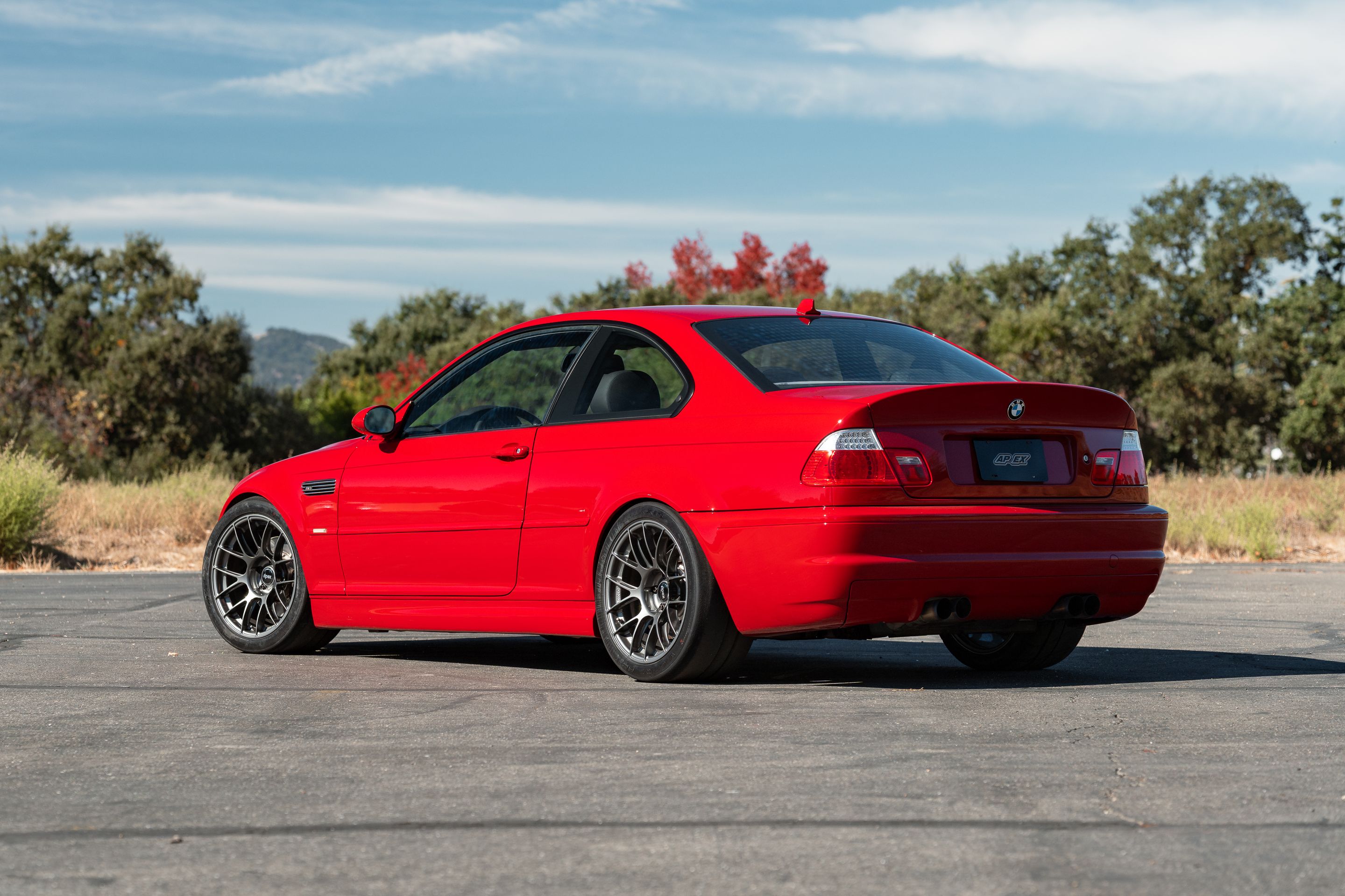 Red BMW E46 M3 with 18" EC-7RS Apex wheels in Anthracite