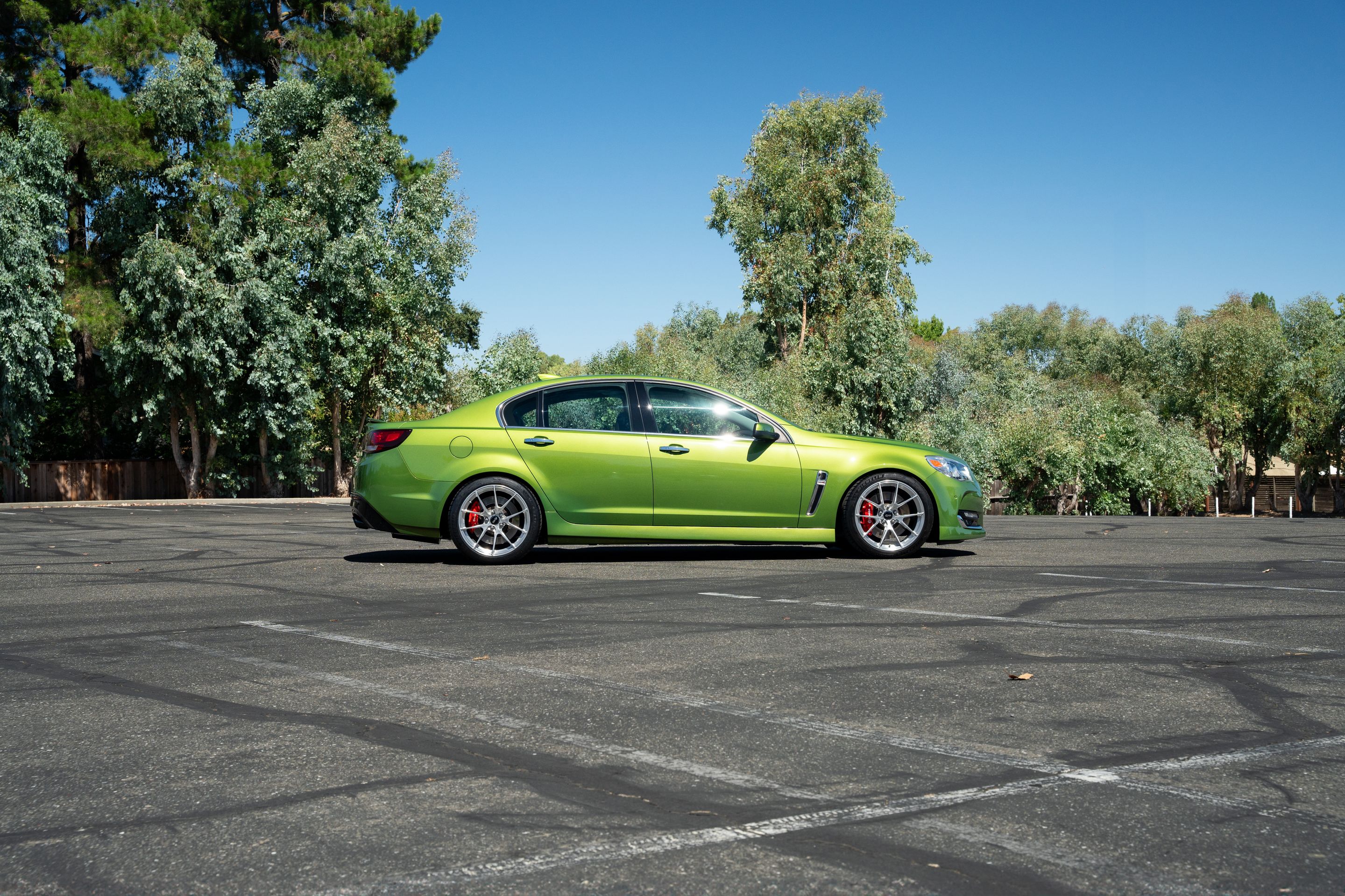 Green Chevrolet SS with 19" VS-5RS Apex wheels in Brushed Clear