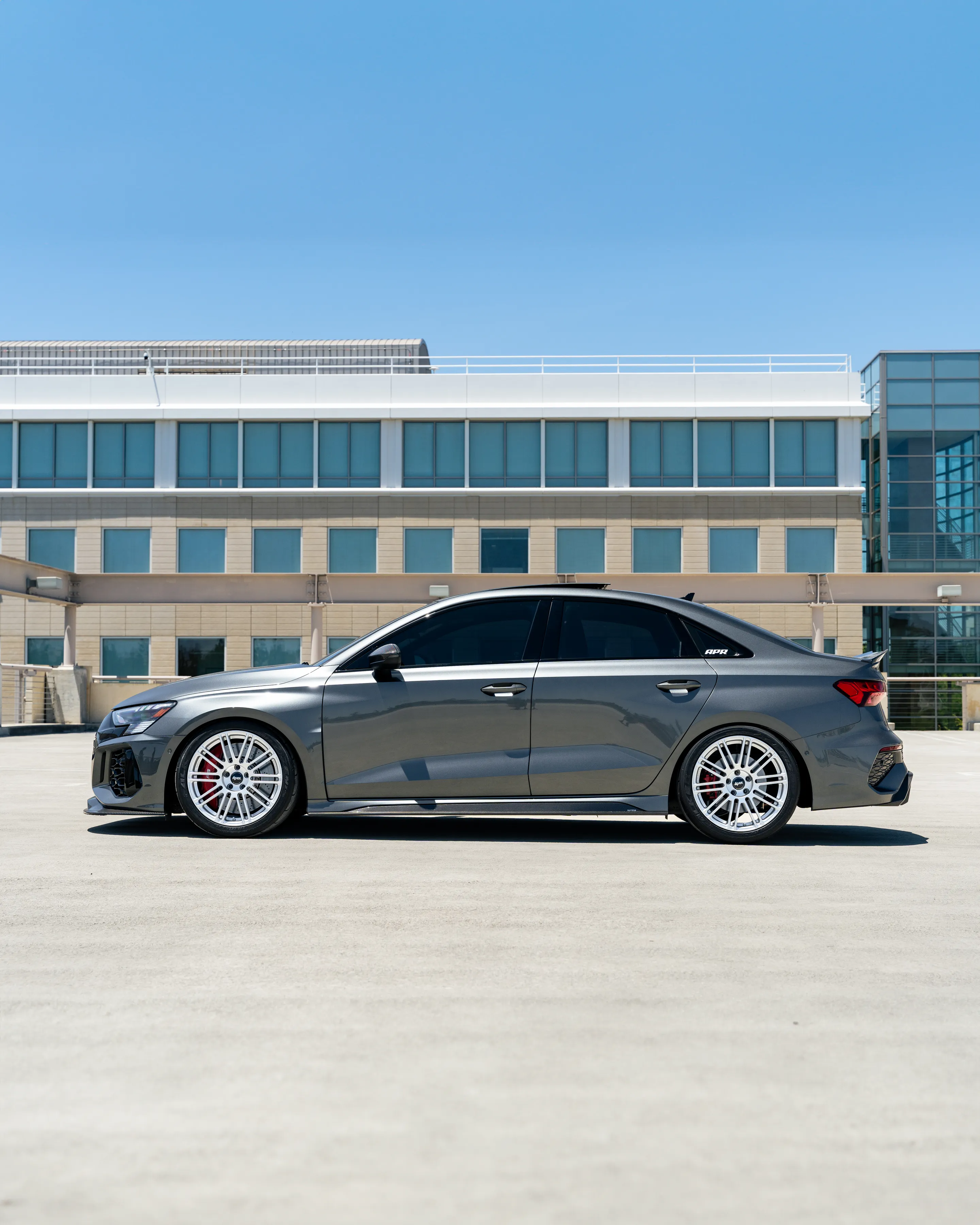 Grey Audi 8Y RS 3 with 18" TC-10RT Apex wheels in Race Silver
