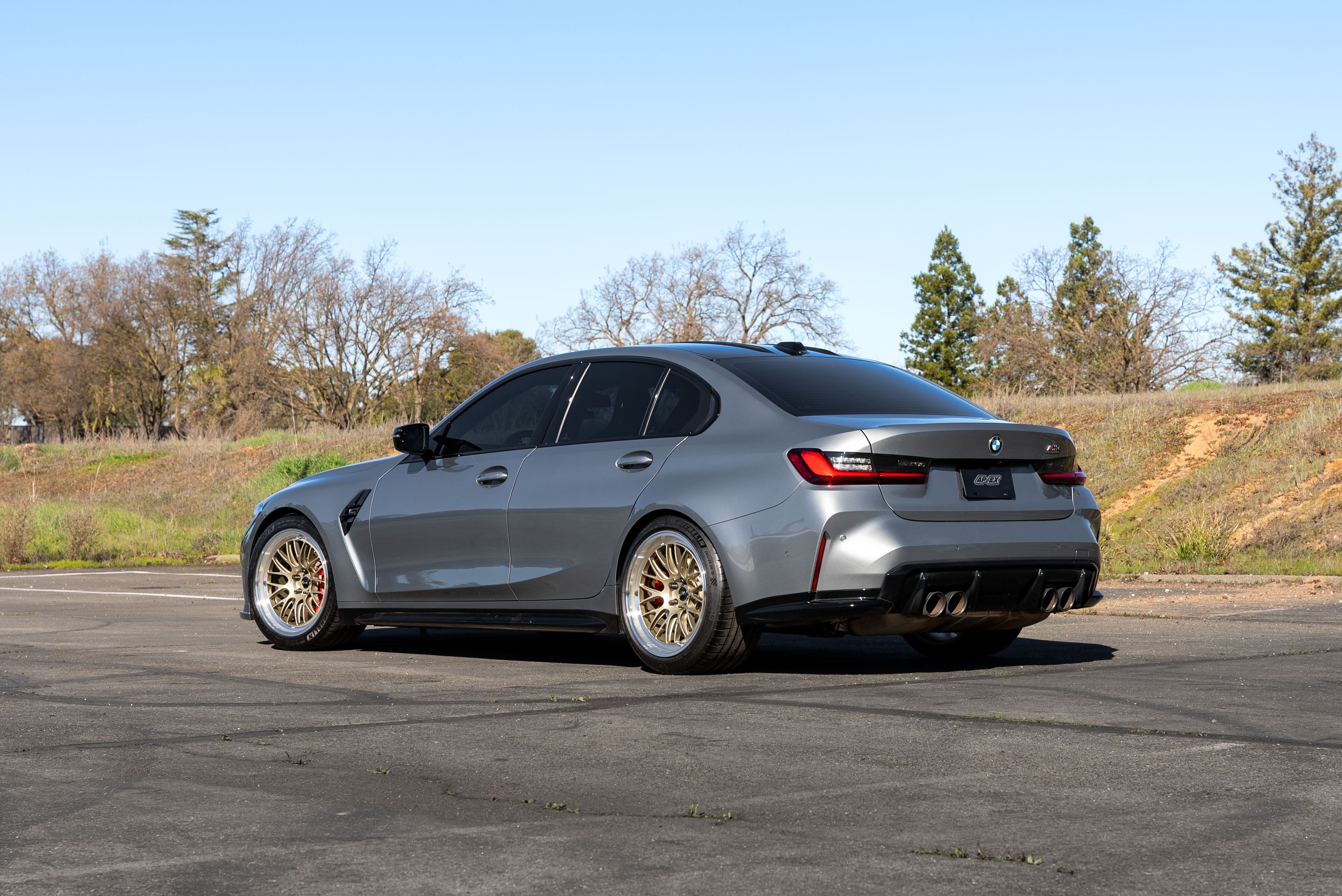 Grey BMW G80 M3 with 19" ML-10RT Apex wheels in Machined Lip Gloss Motorsport Gold