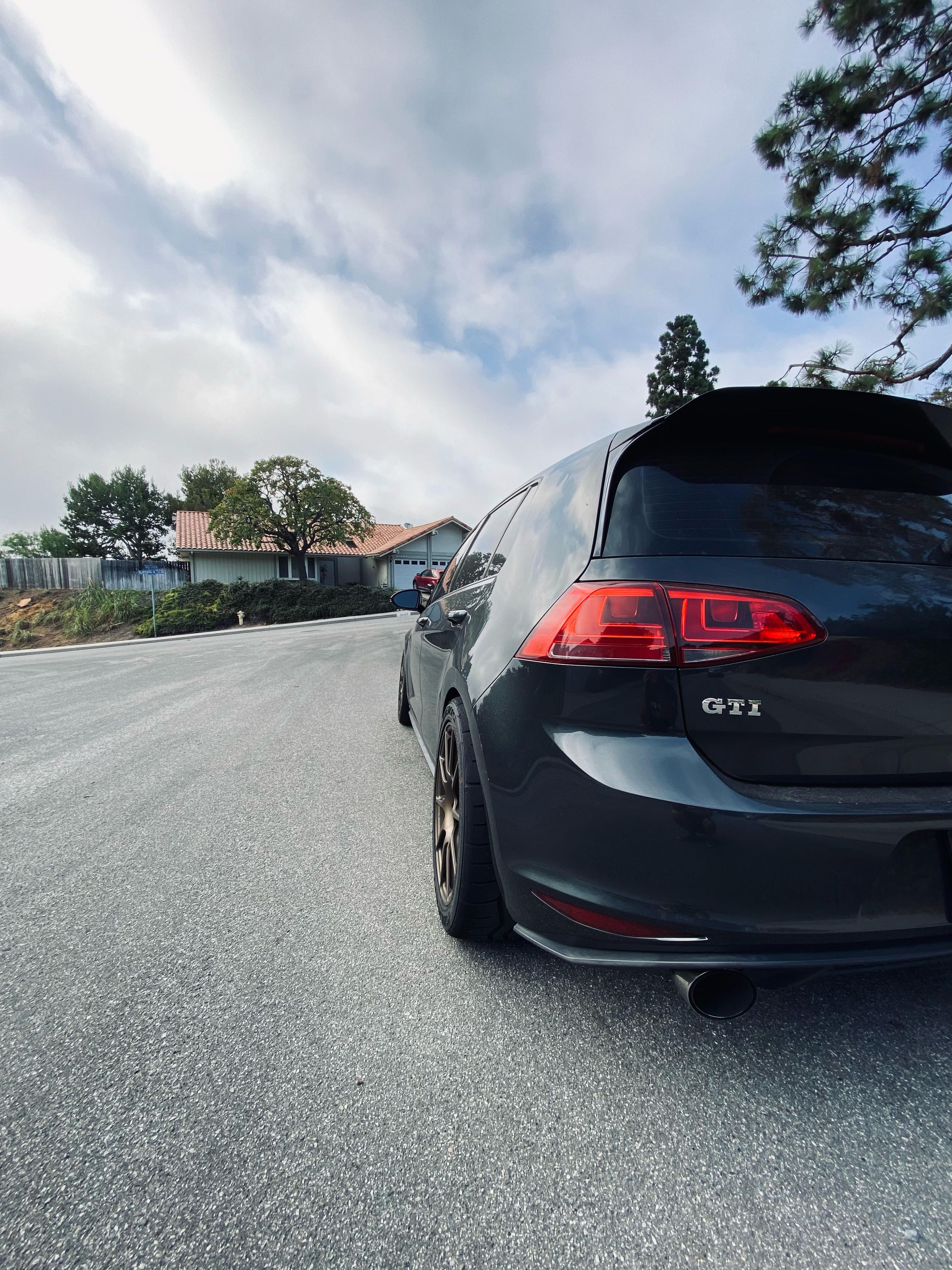 Grey VW MK7 GTI with 17" SM-10 Apex wheels in Satin Bronze
