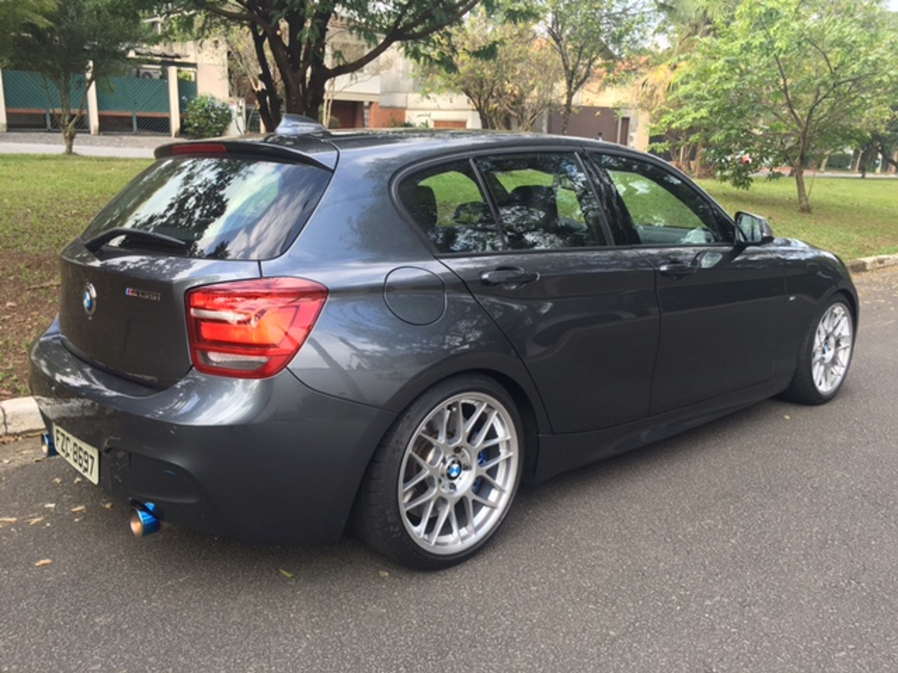 Grey BMW F20 Hatchback 1 Series with 18" ARC-8 Apex wheels in Hyper Silver