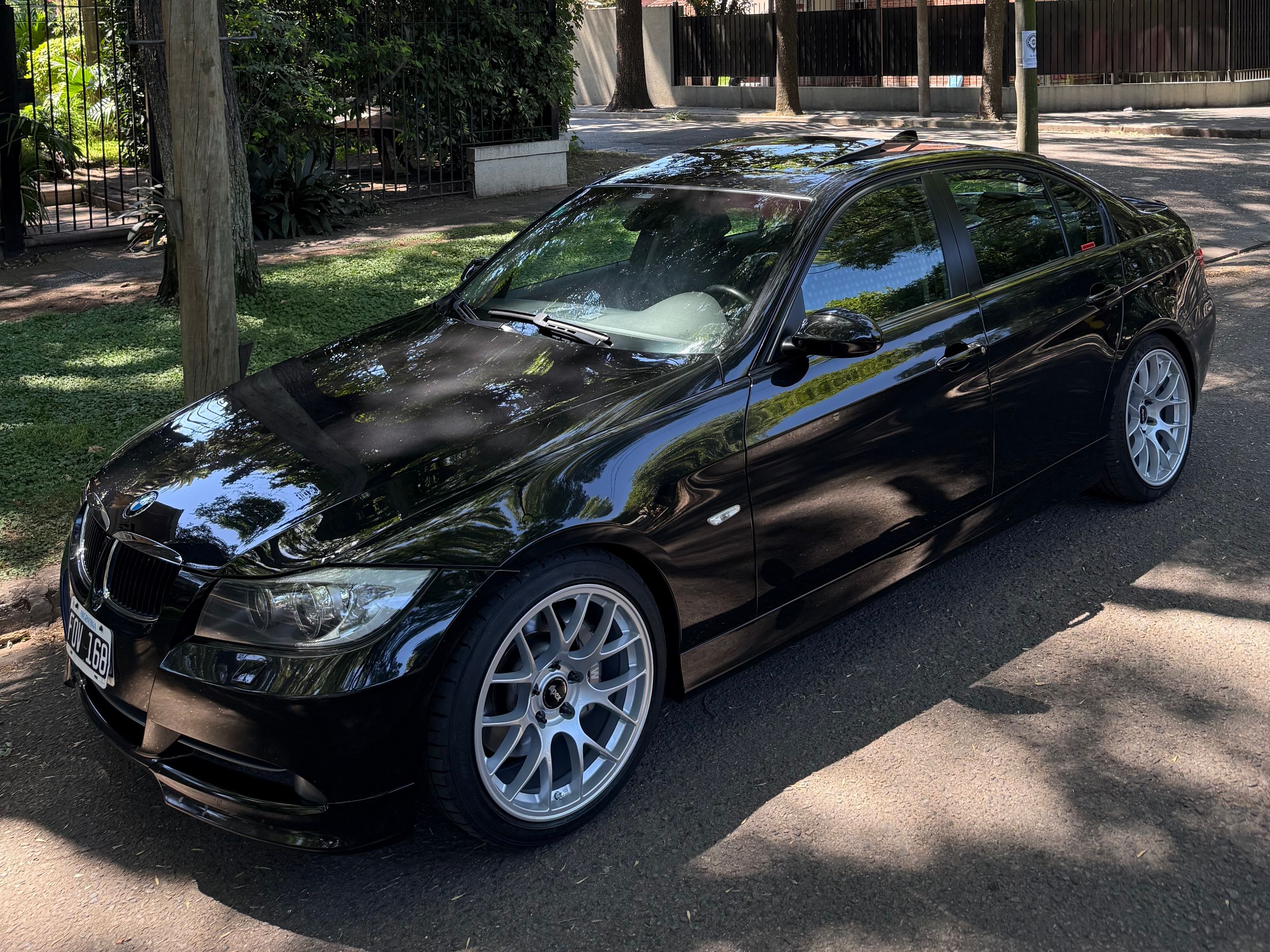 Black BMW E90 Sedan 3 Series with 18" EC-7 Apex wheels in Race Silver