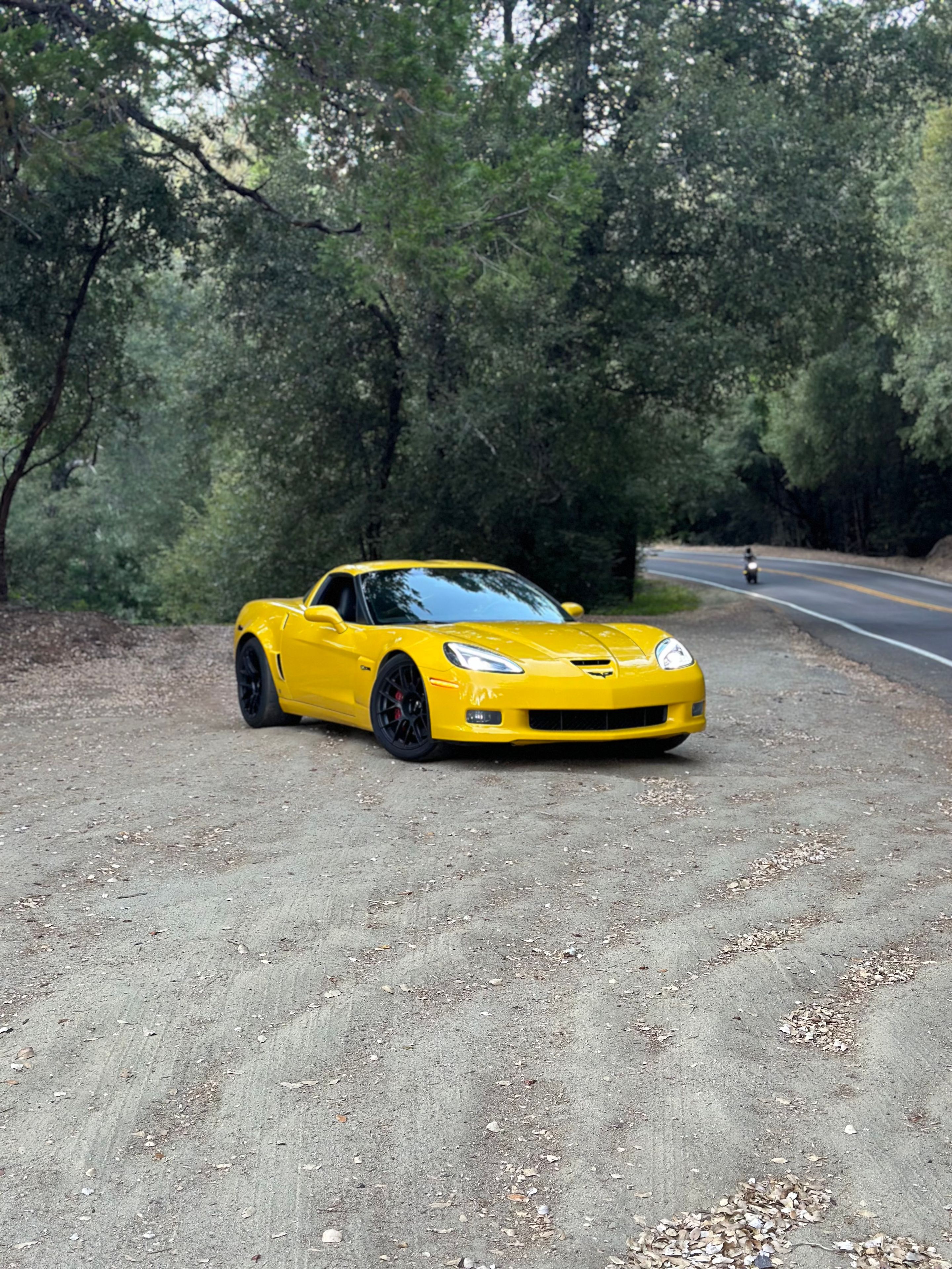 Yellow Chevrolet C6 Corvette Z06 with 19" EC-7RS Apex wheels in Satin Black