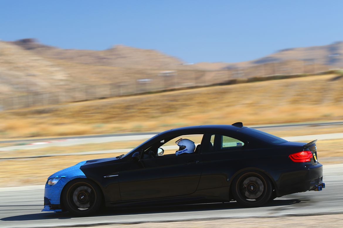 Black BMW E92 Coupe M3 with 18" ARC-8 Apex wheels in Satin Bronze