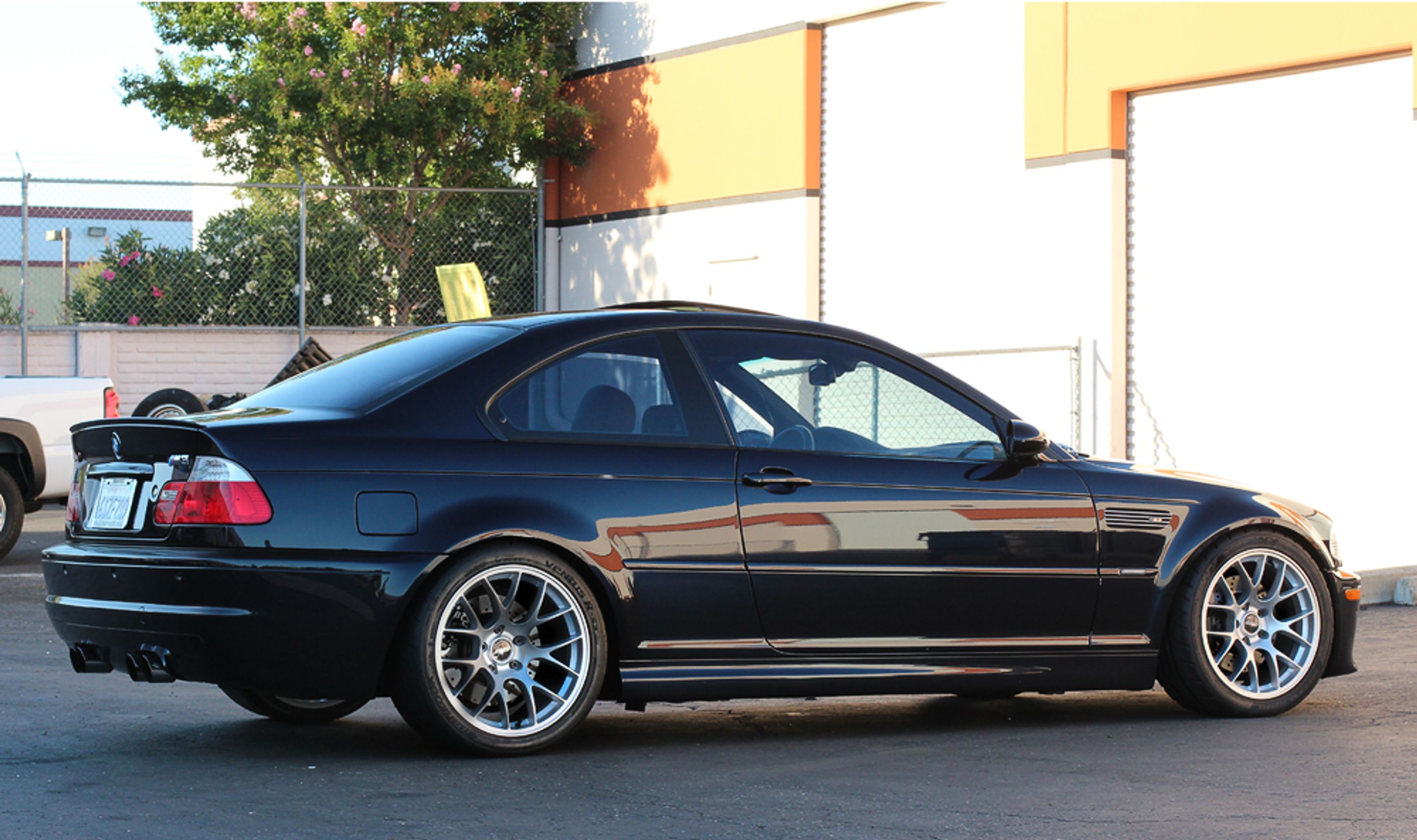 Black BMW E46 M3 with 18" EC-7 Apex wheels in Race Silver