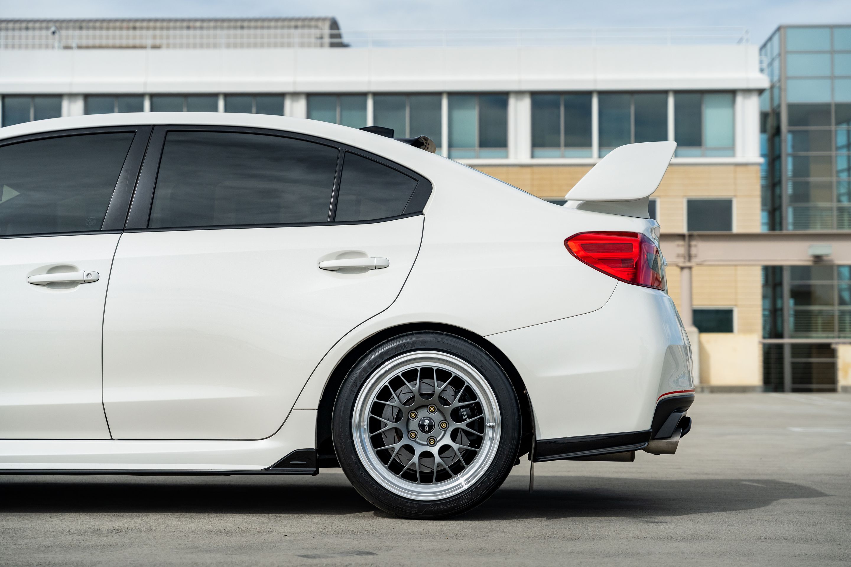 White Subaru VA WRX STI with 18" ML-10RT Apex wheels in Machined Lip Anthracite