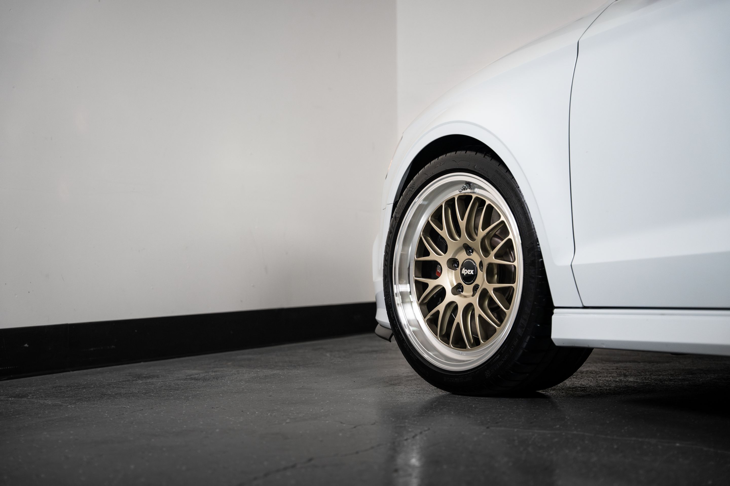 White Audi 8V S3 with 18" ML-10RT Apex wheels in Machined Lip Gloss Motorsport Gold