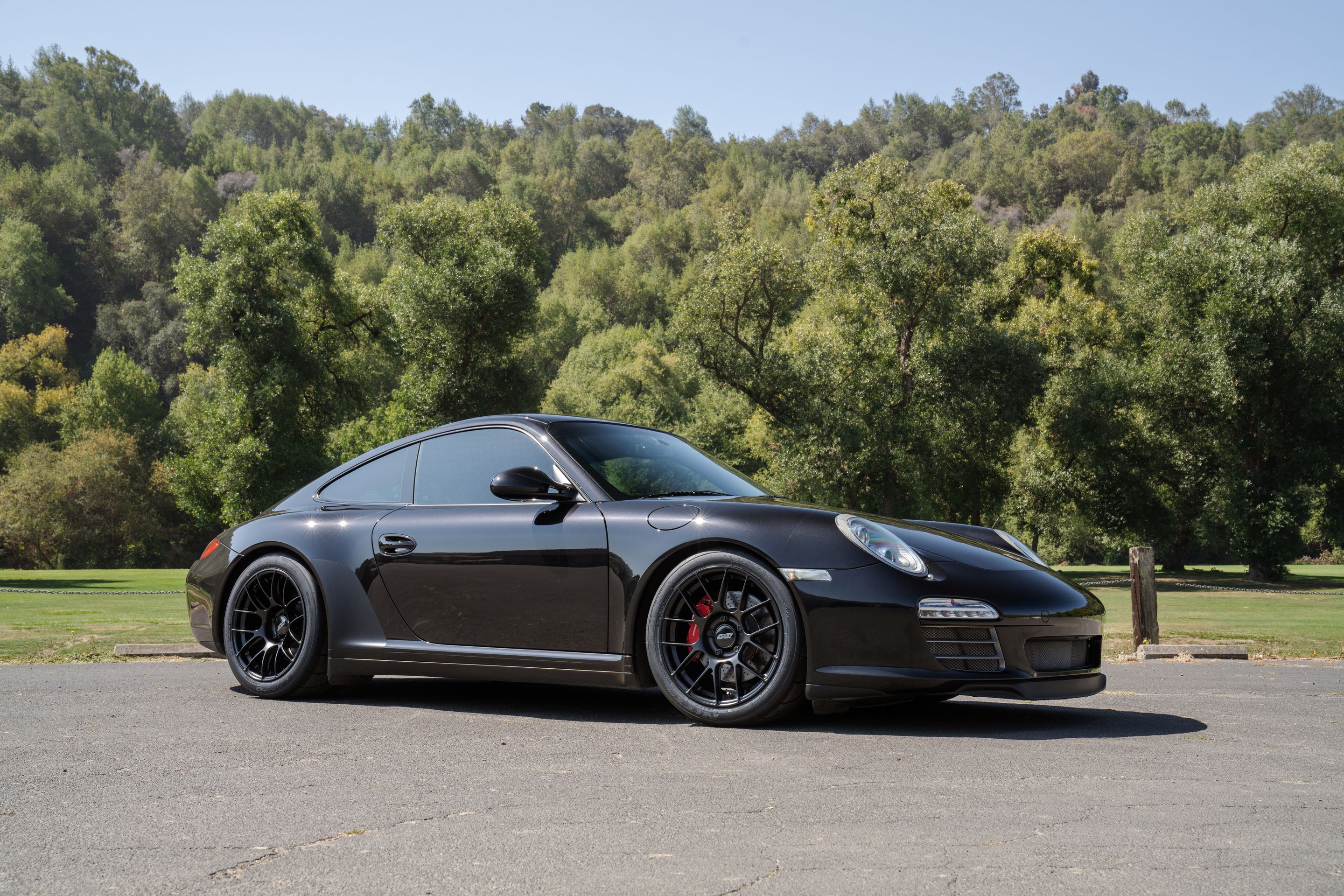 Black Porsche 911 997 Carrera 4S with 18" EC-7RS Apex wheels in Satin Black