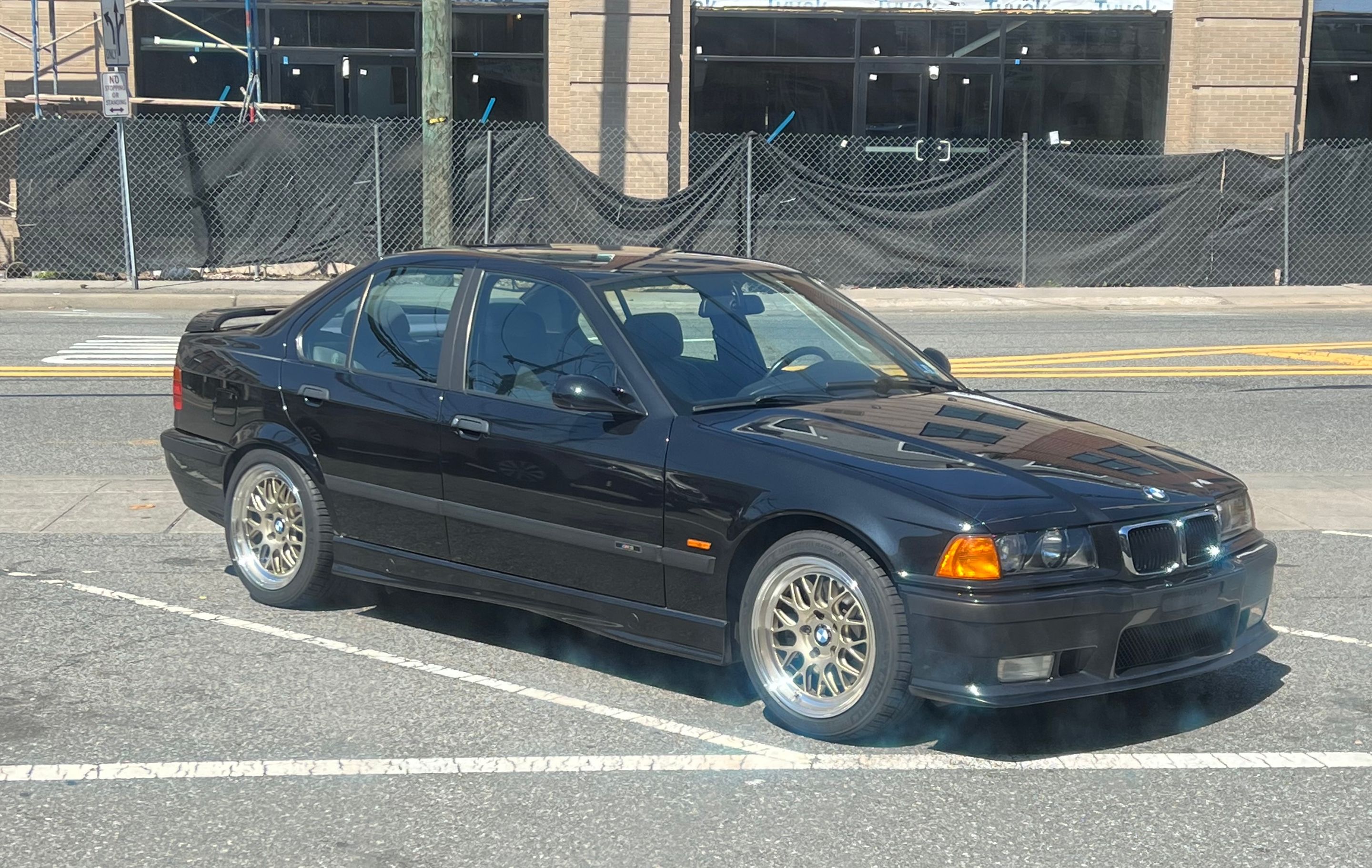 Black BMW E36 M3 with 17" ML-10RT Apex wheels in Machined Lip Gloss Motorsport Gold