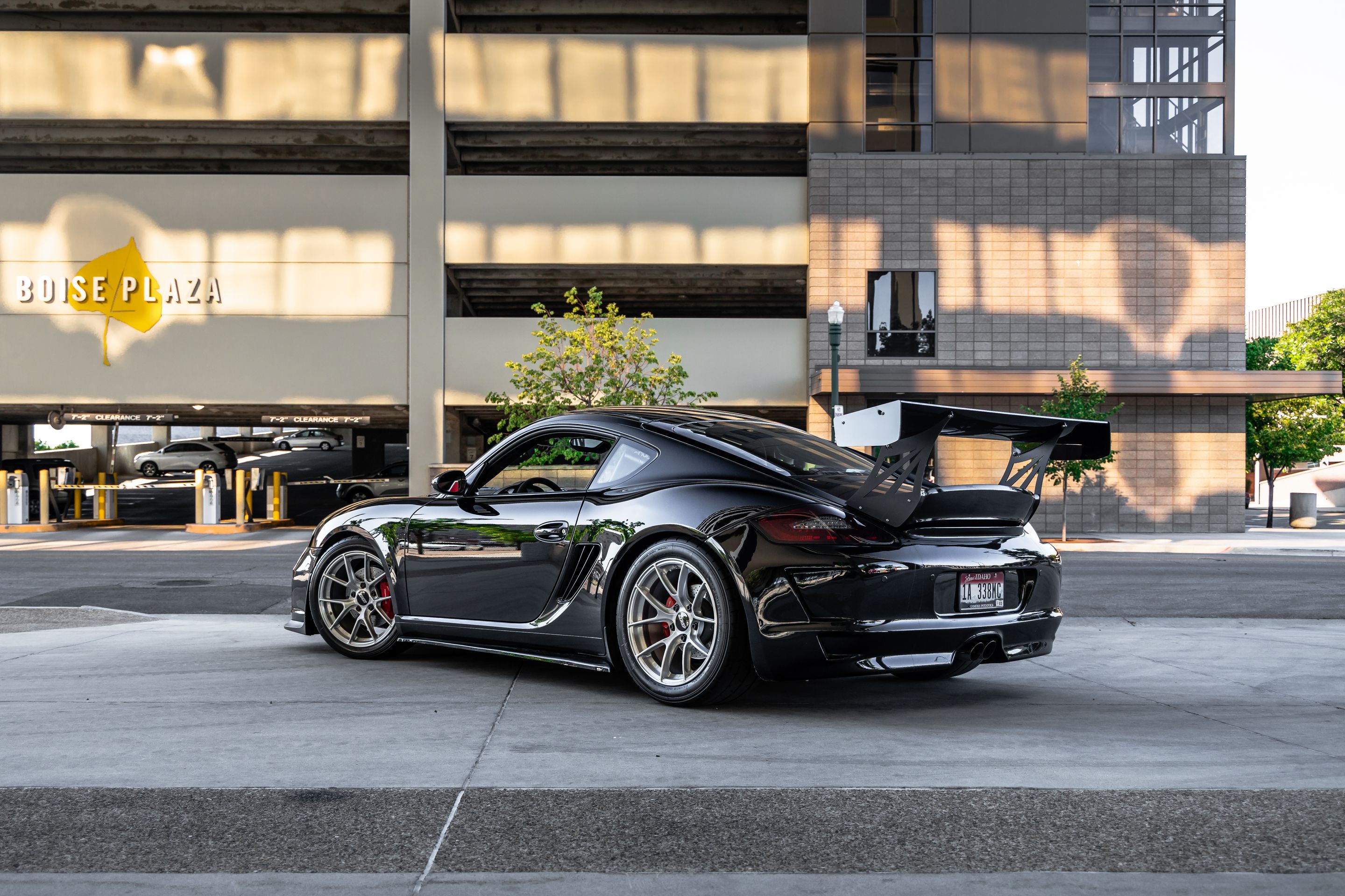 Black Porsche 987 Cayman S with 18" VS-5RS Apex wheels in Brushed Clear
