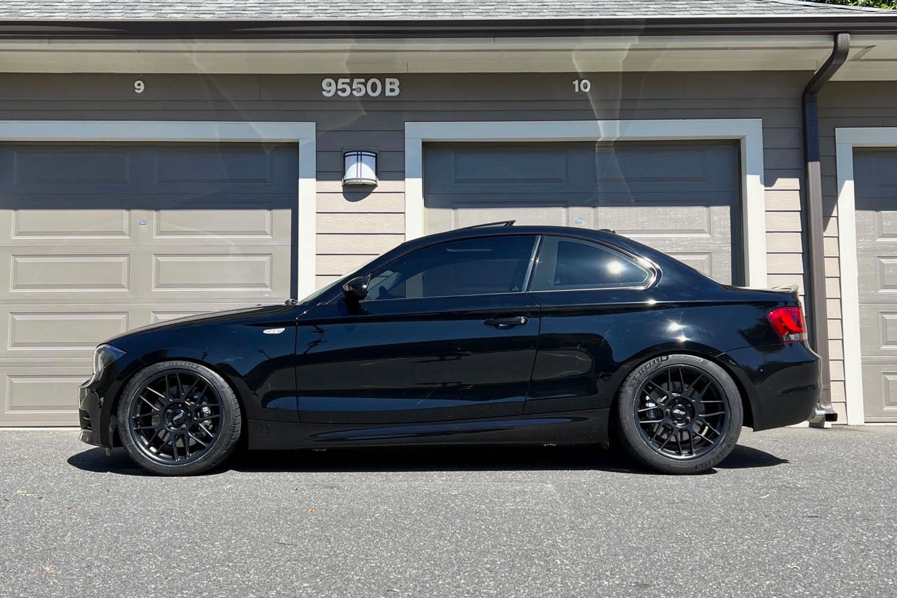 Black BMW E82 Coupe 1 Series with 18" ARC-8 Apex wheels in Satin Black