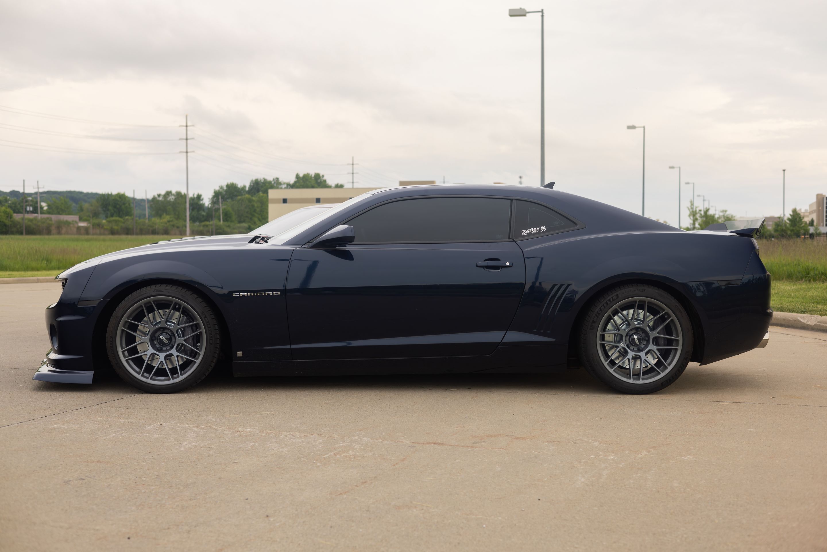 Blue Chevrolet 5th Gen Camaro SS with 19" ARC-8 Apex wheels in Anthracite